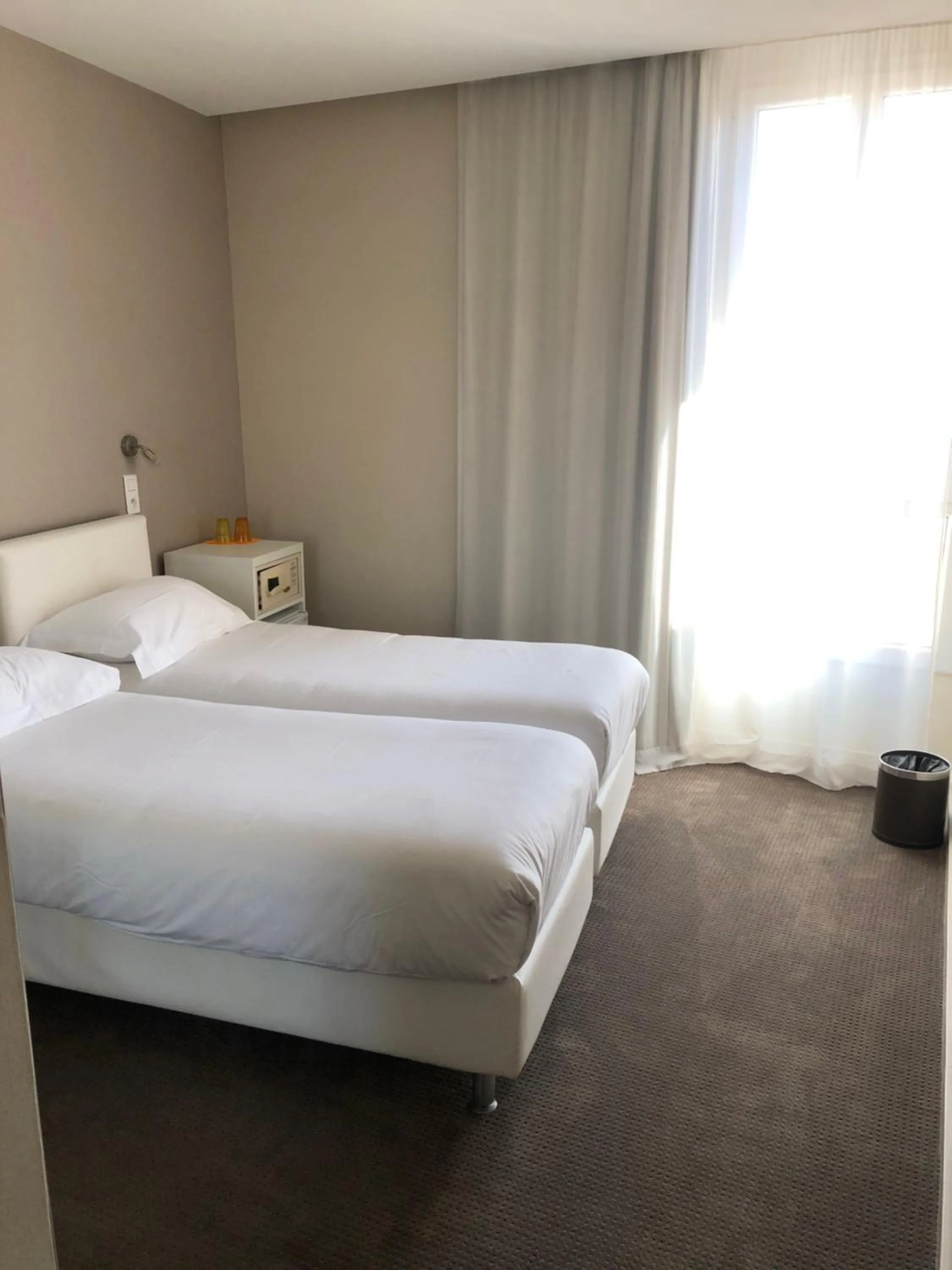 Photo of the whole room, Bed in Hôtel Ligure