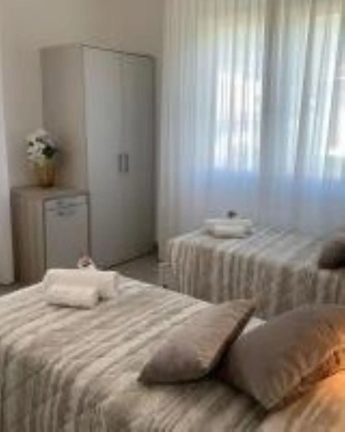 towels, Bed in HOTEL LORENA