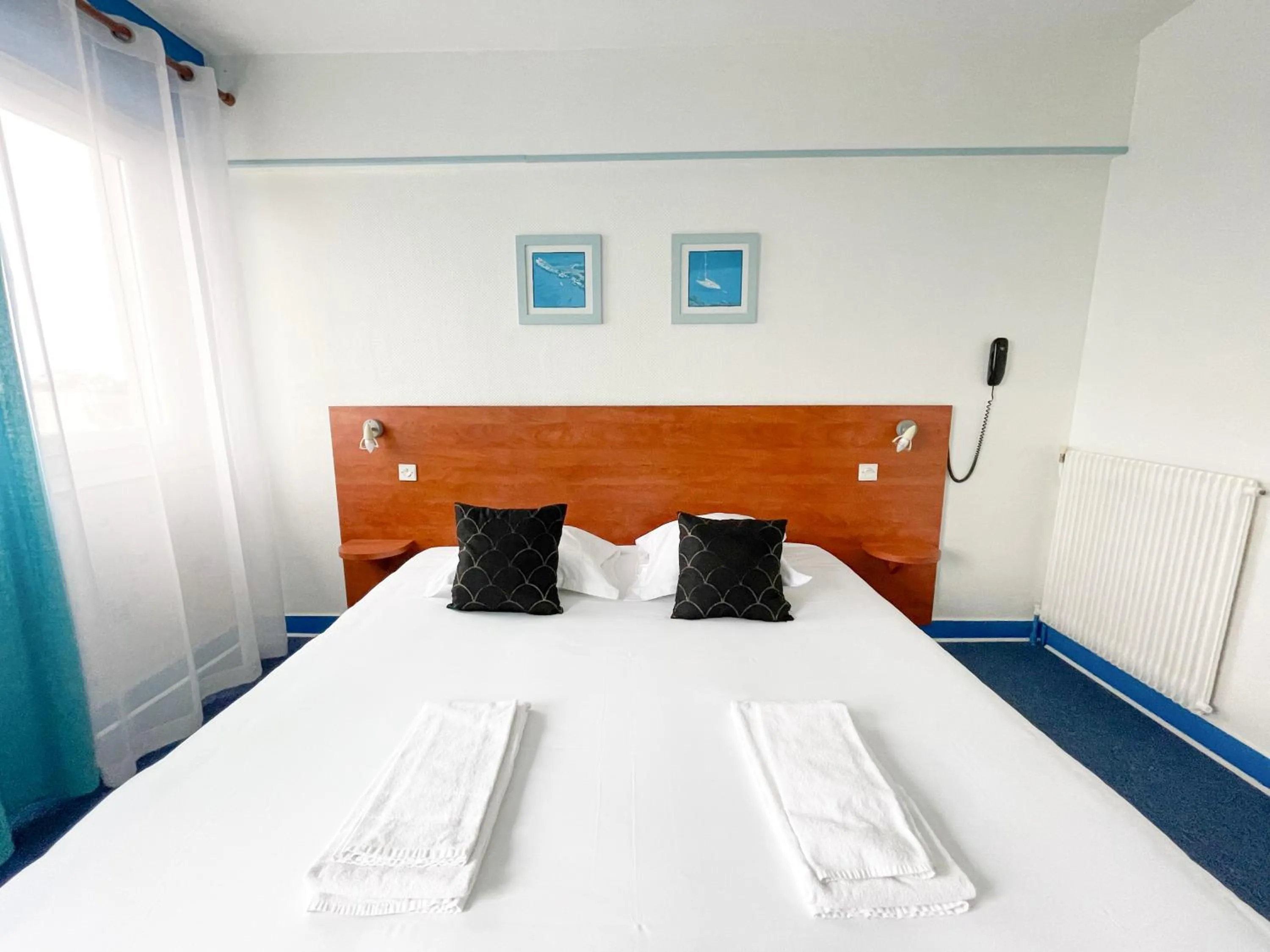 Bed in Hotel les Alignements