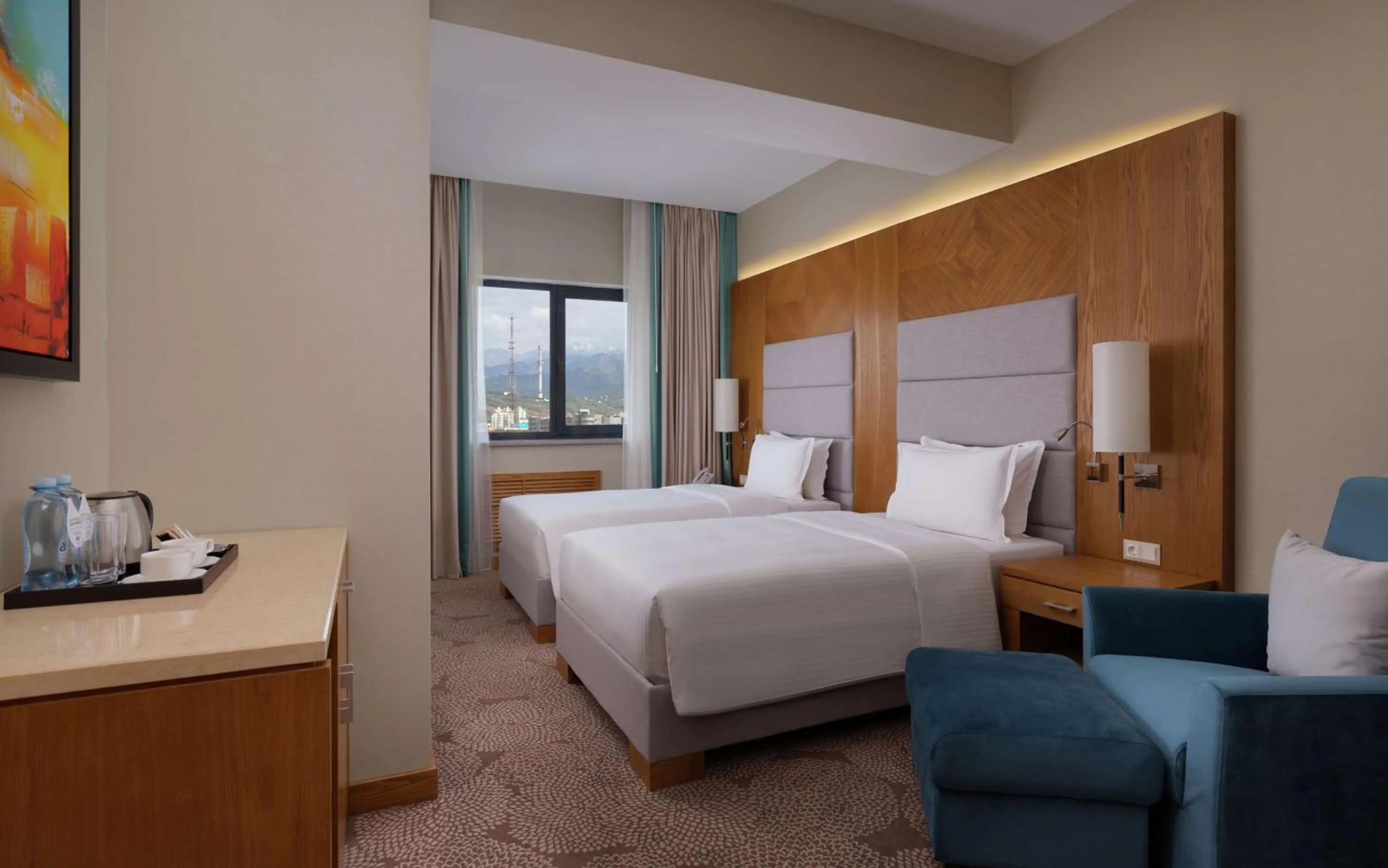 Living room, Bed in DoubleTree by Hilton Almaty