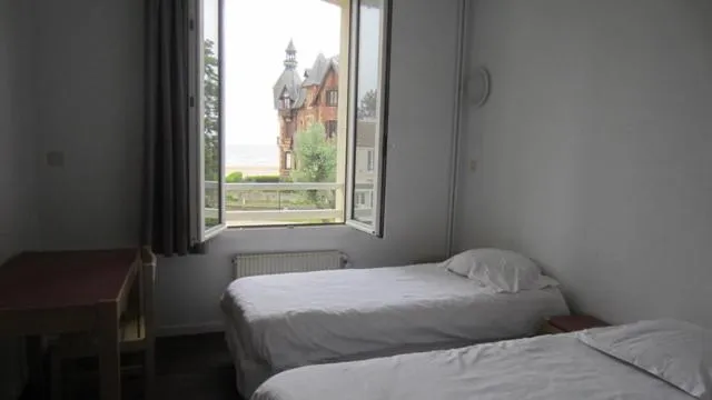 Bedroom, Bed in Centre de Vacances CPCV Normandie à 50 metres de la plage de Houlgate
