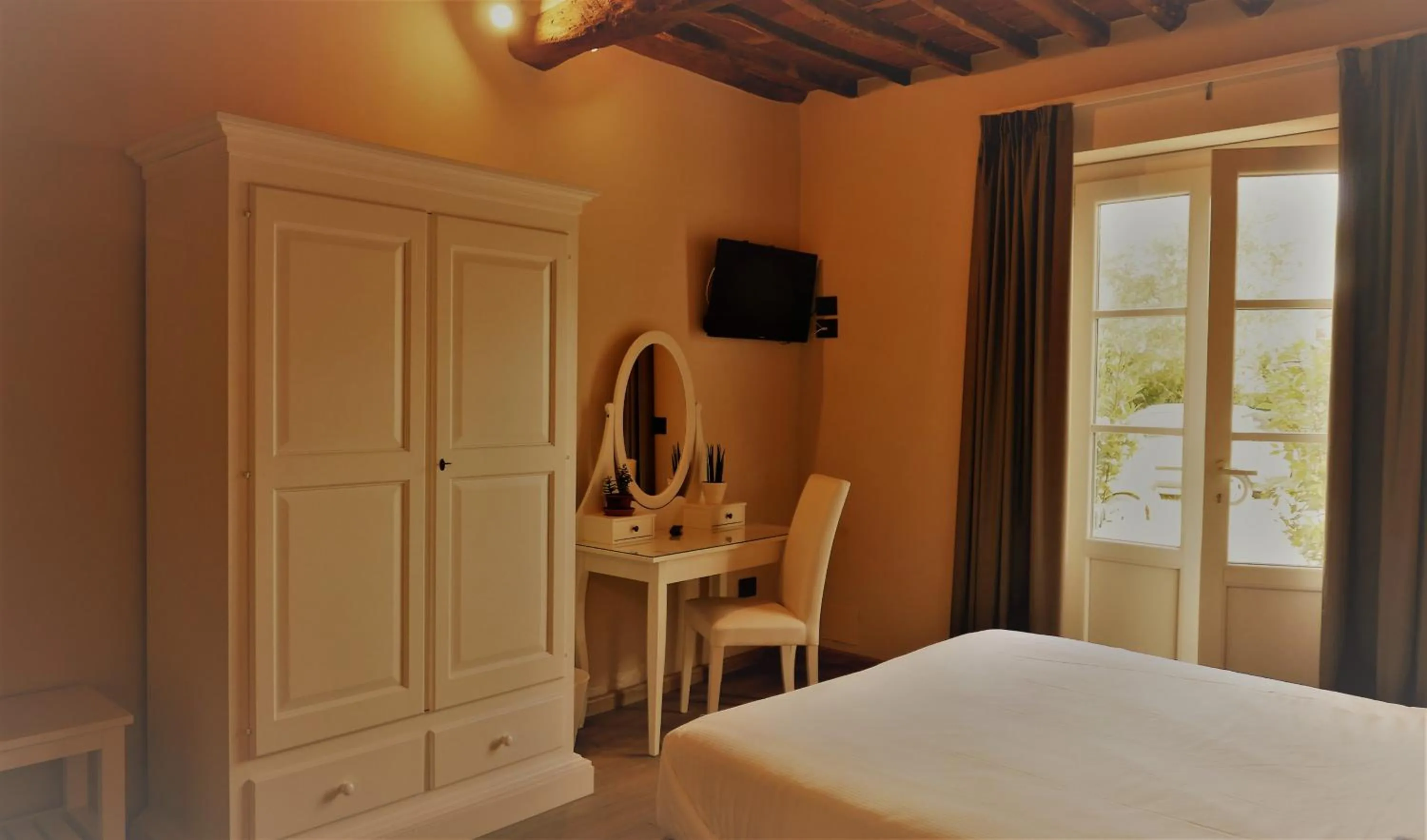 Bed in Il Tiglio Jacuzzi&Sauna