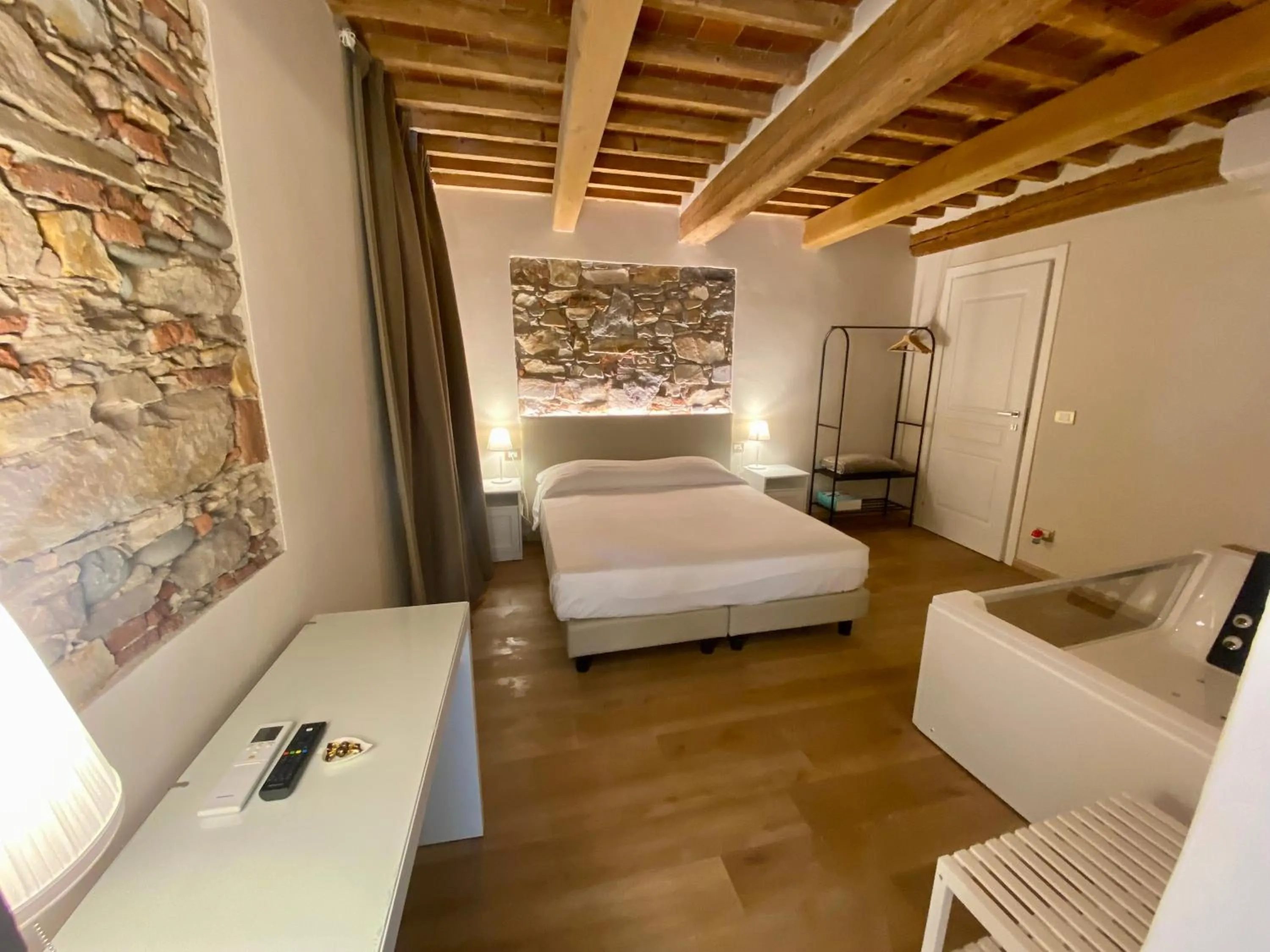 Bed in Il Tiglio Jacuzzi&Sauna
