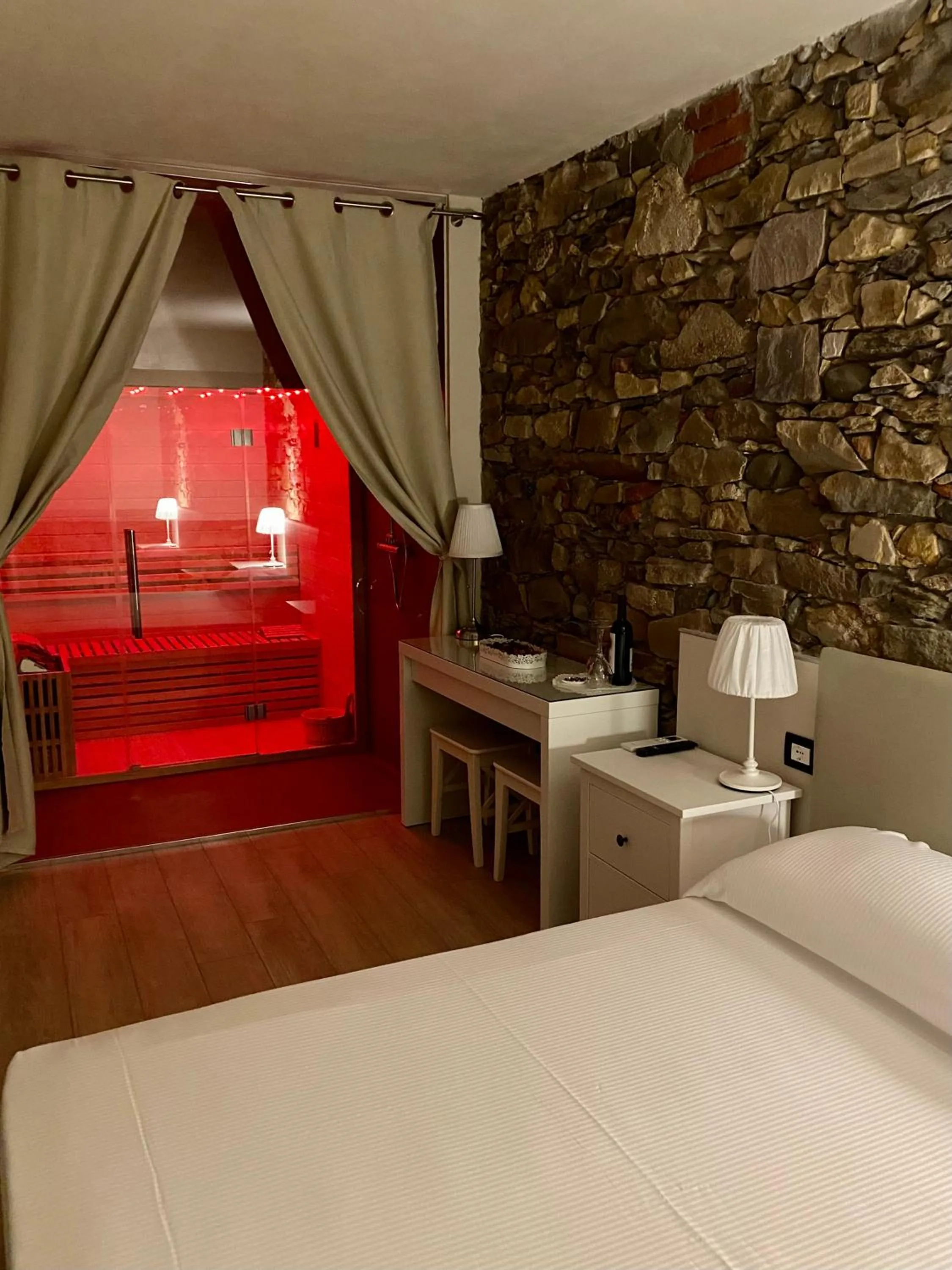 Bed in Il Tiglio Jacuzzi&Sauna