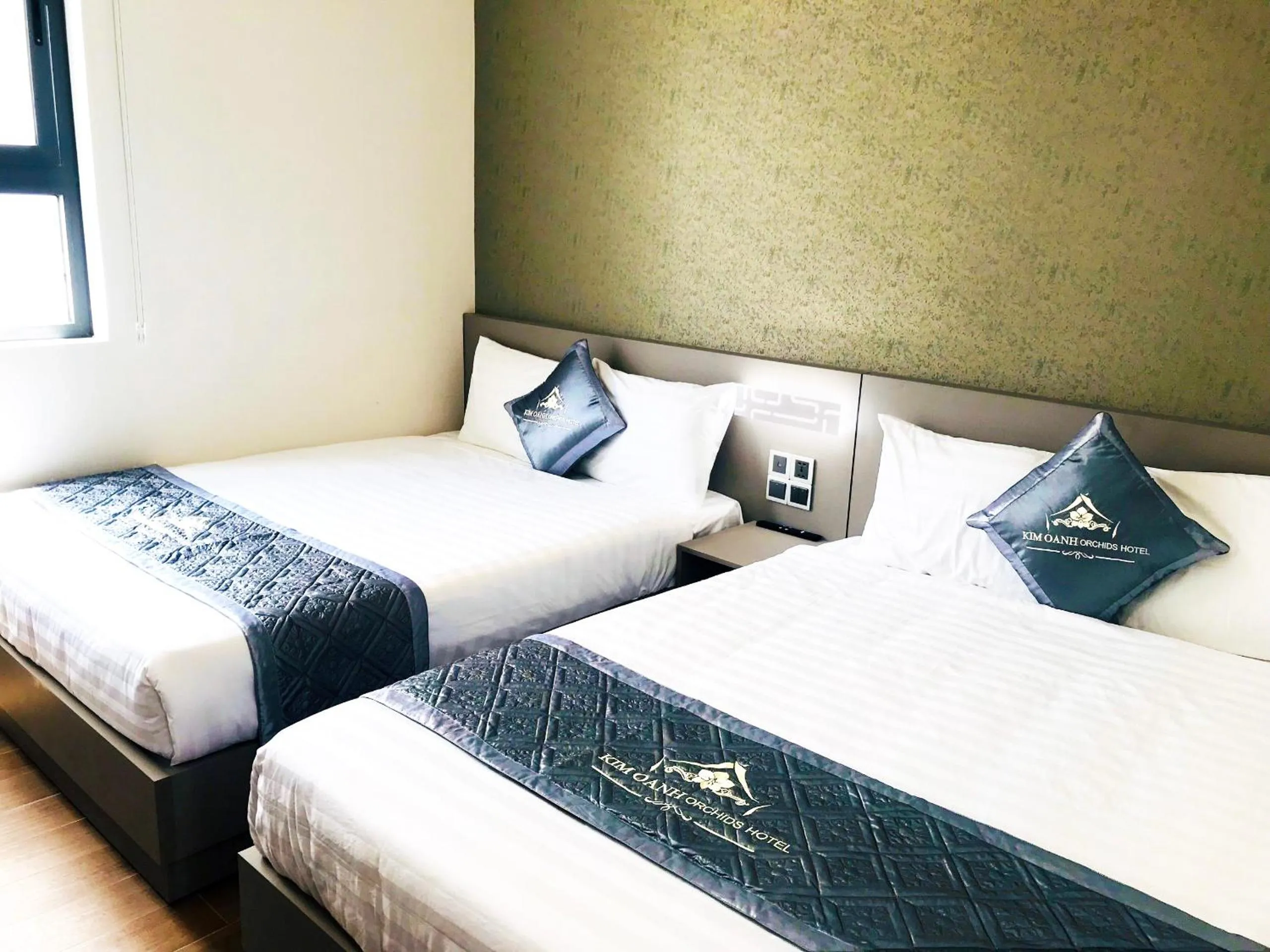 Bed in Kim Oanh Orchids Hotel