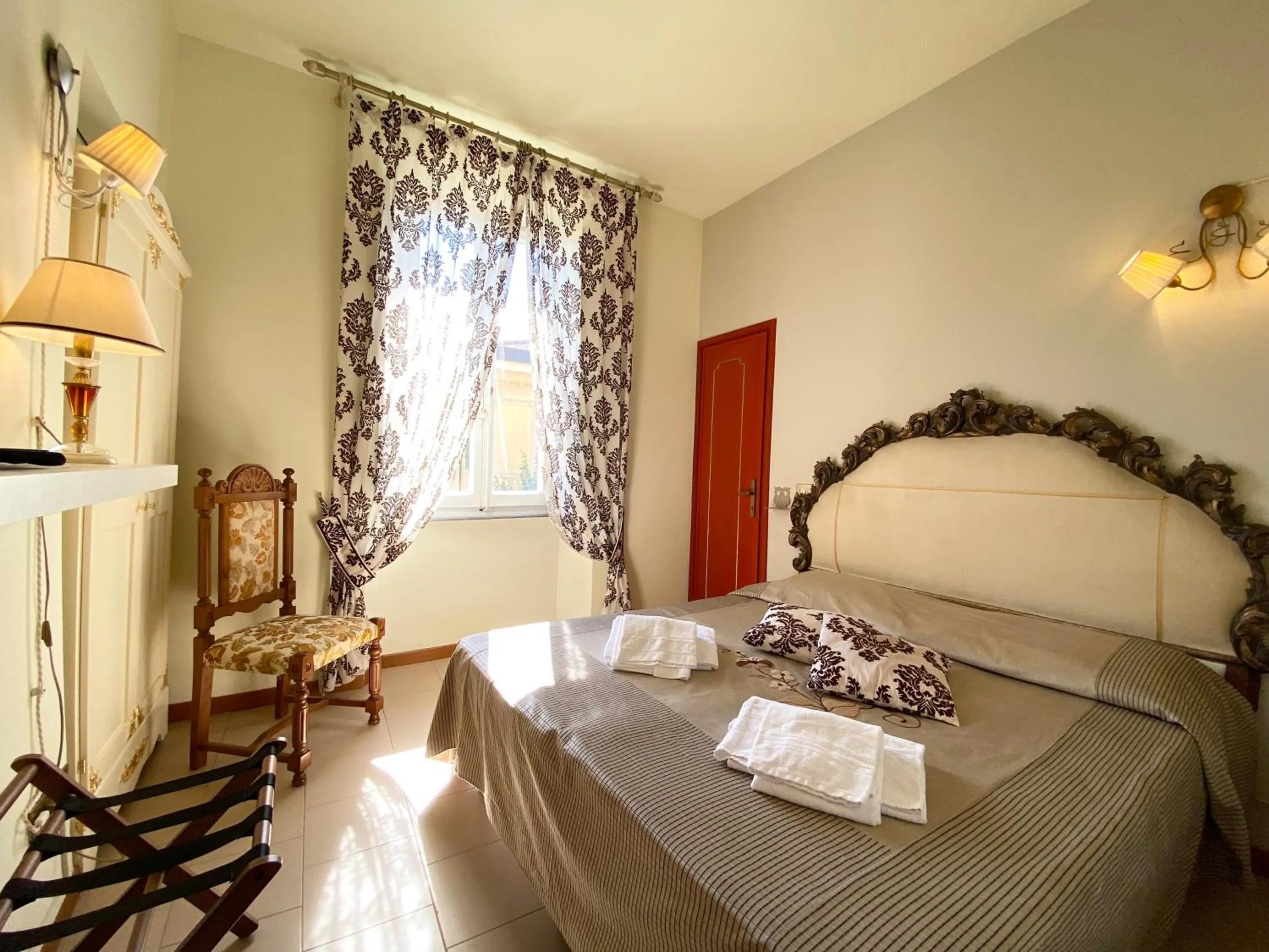 Bed in HOTEL RINASCIMENTO