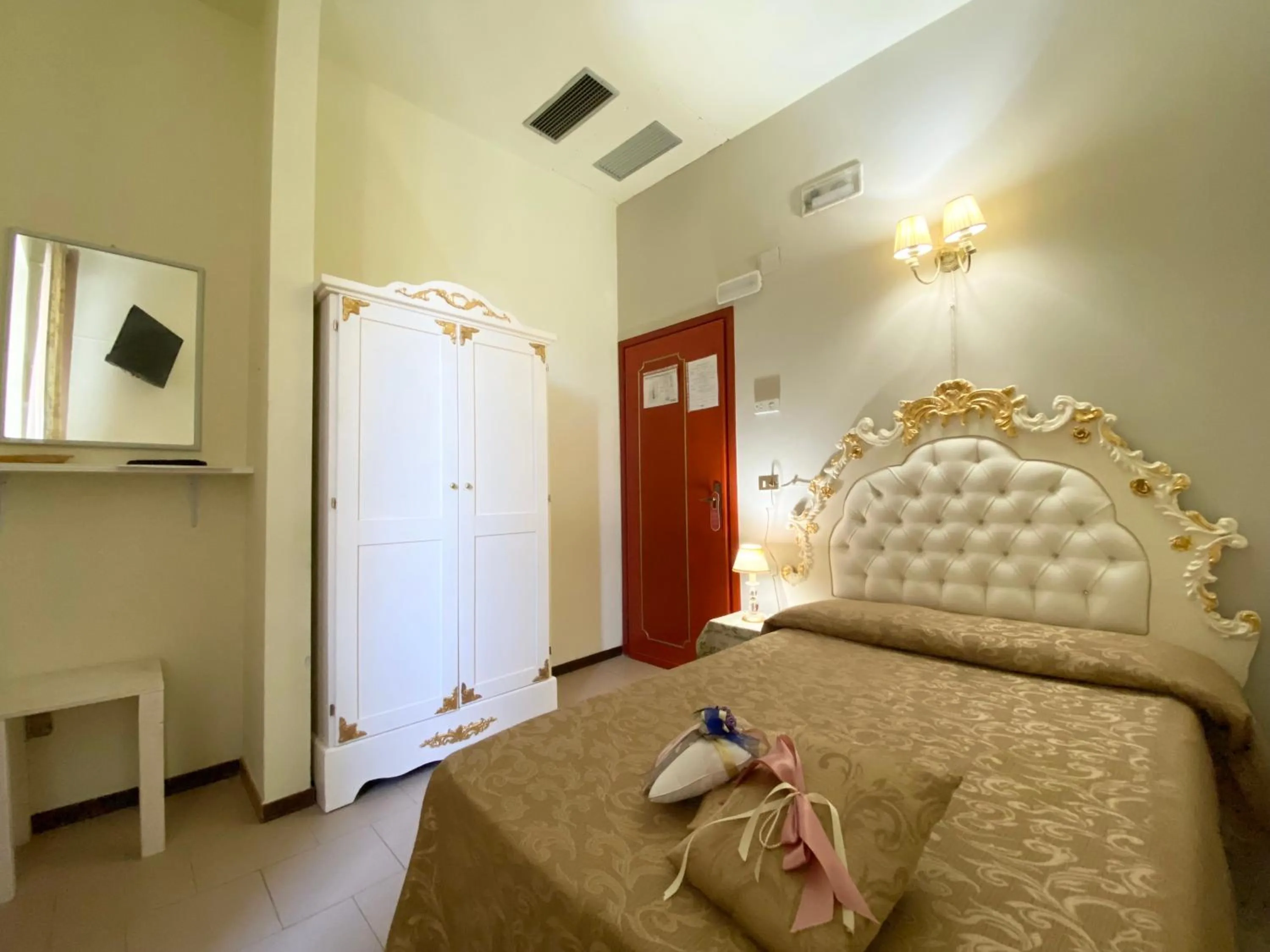 Bed in HOTEL RINASCIMENTO