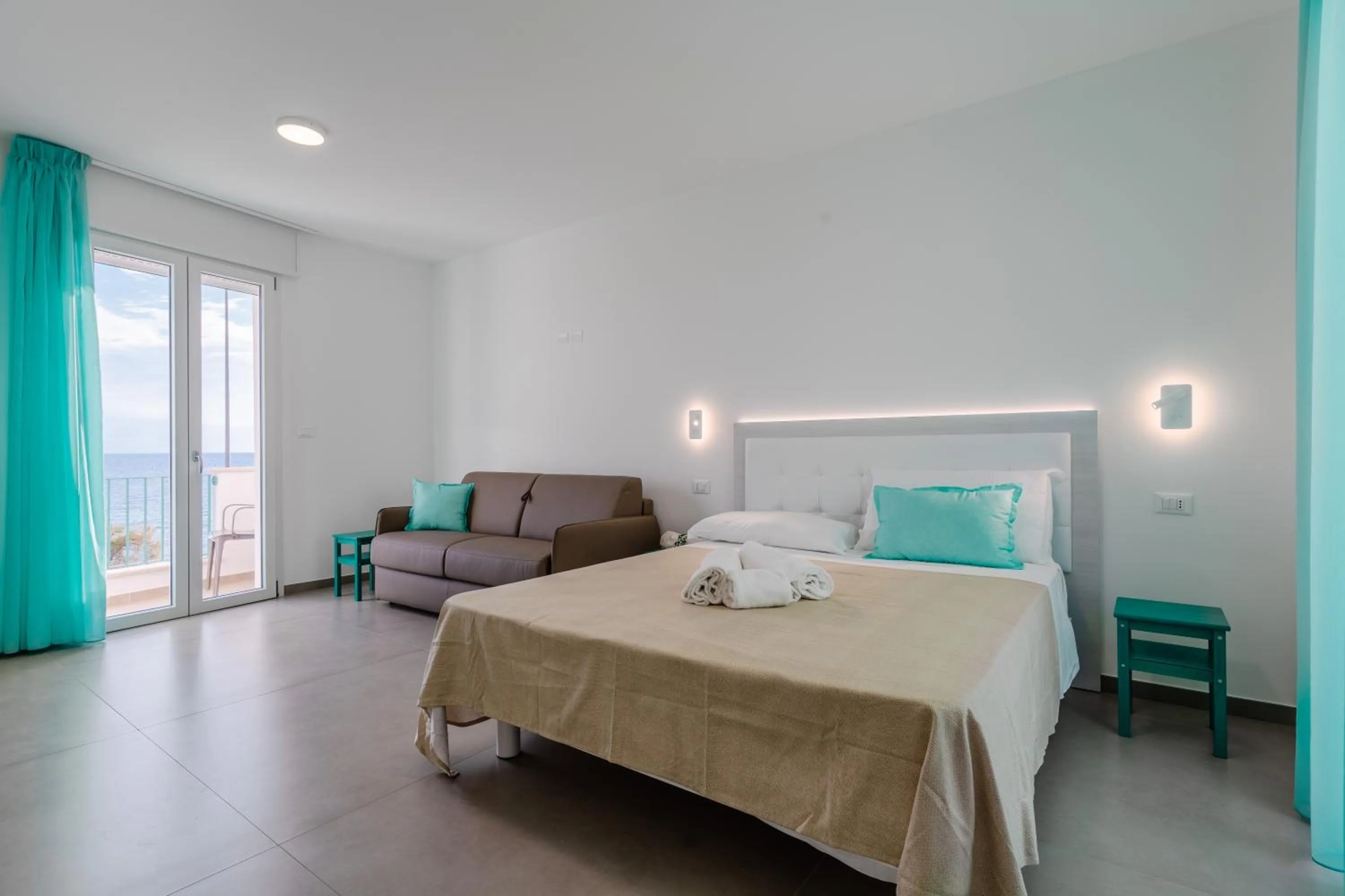 Bed in SMERALDO RESIDENCE