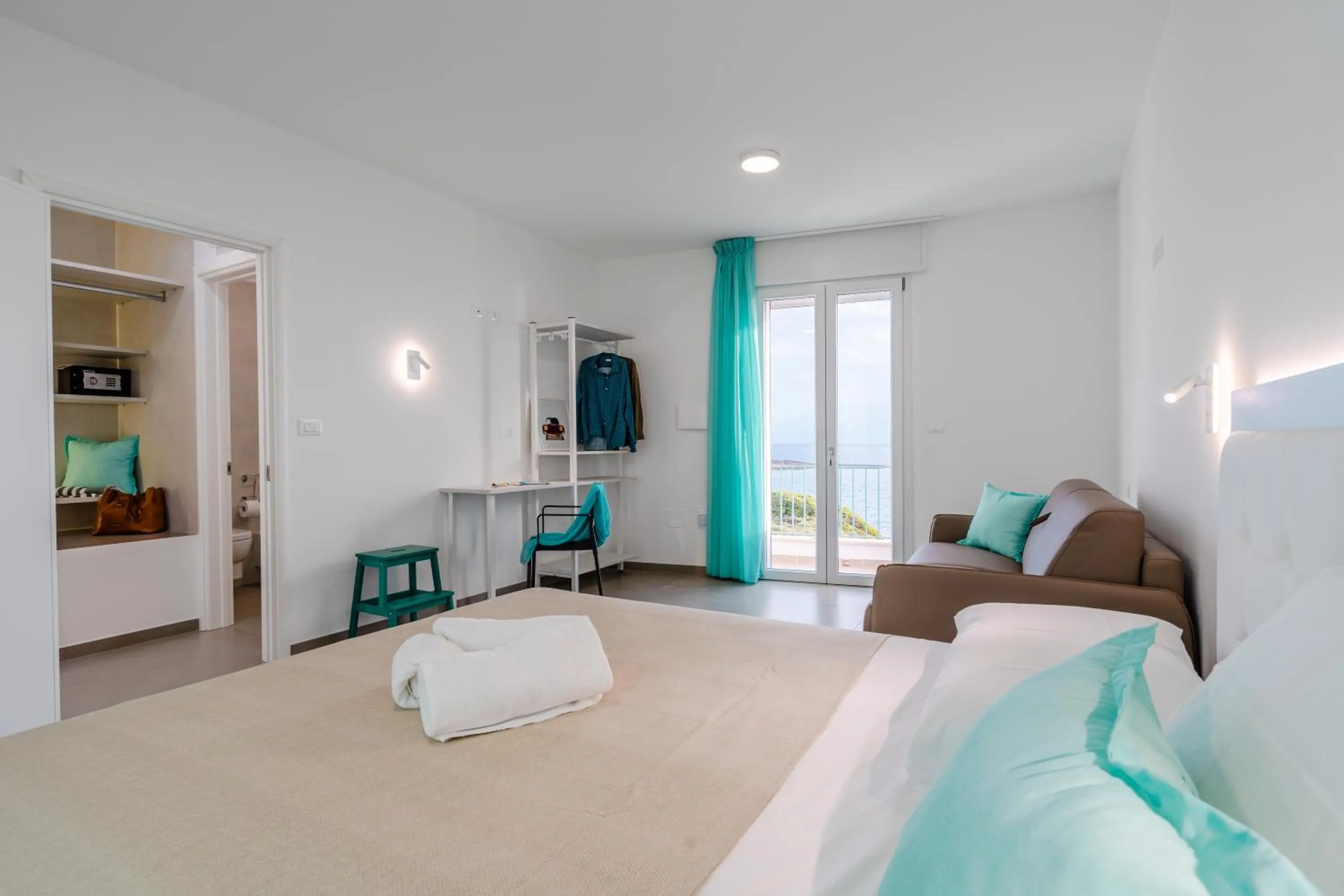 Bed in SMERALDO RESIDENCE