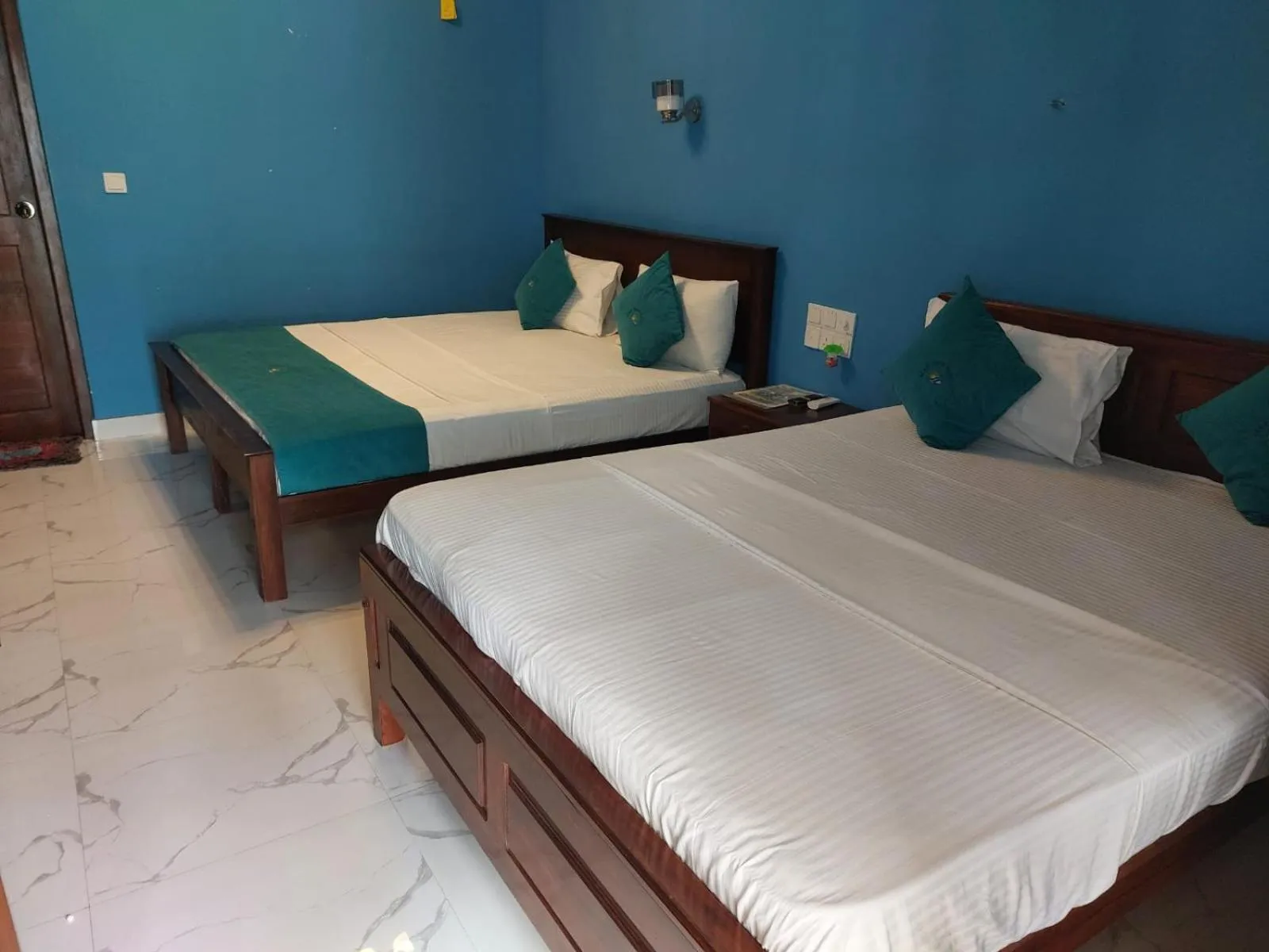 Bed in MRD Beach Hotel