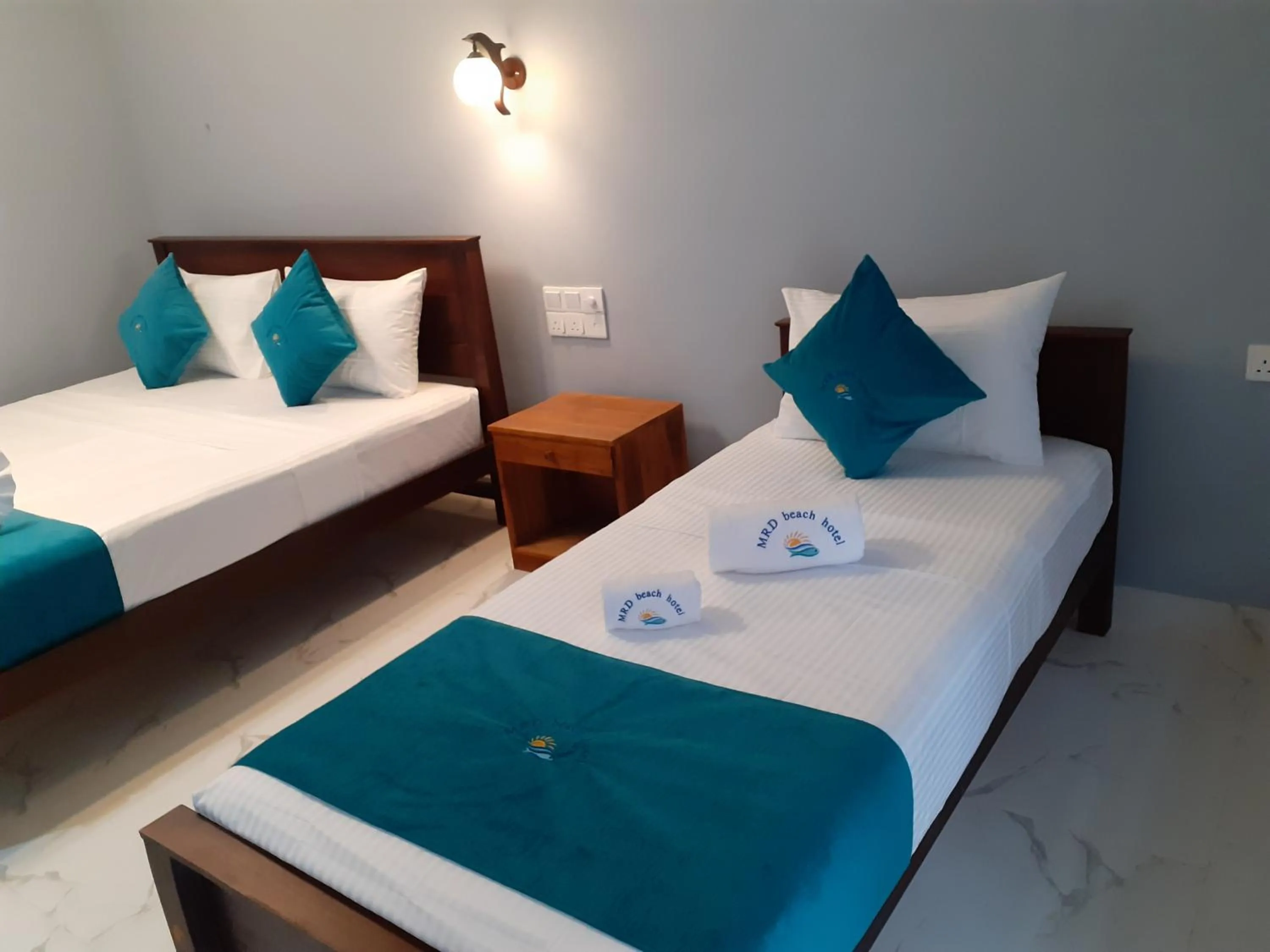 Bedroom in MRD Beach Hotel