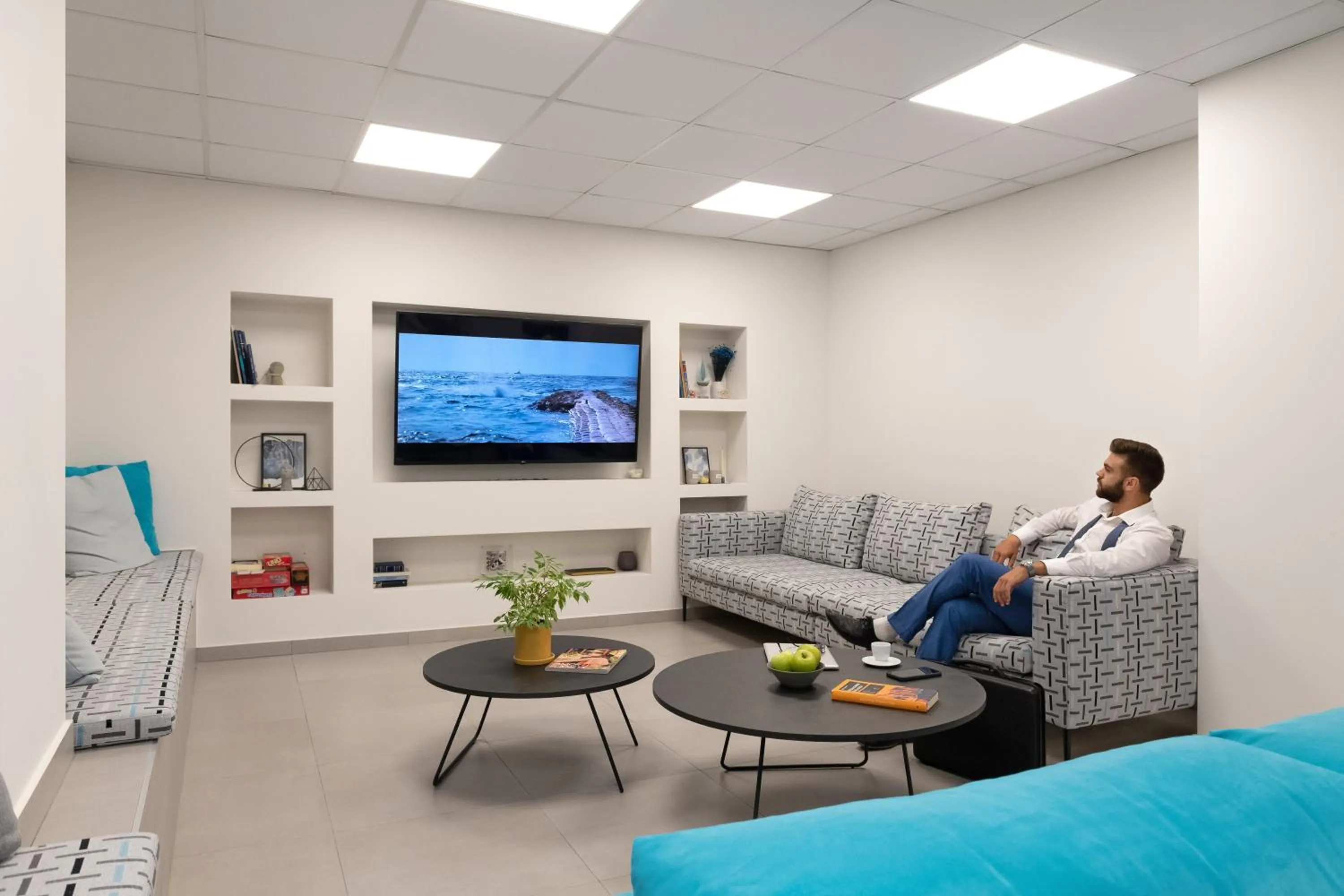 Communal lounge/ TV room in Thess Residences