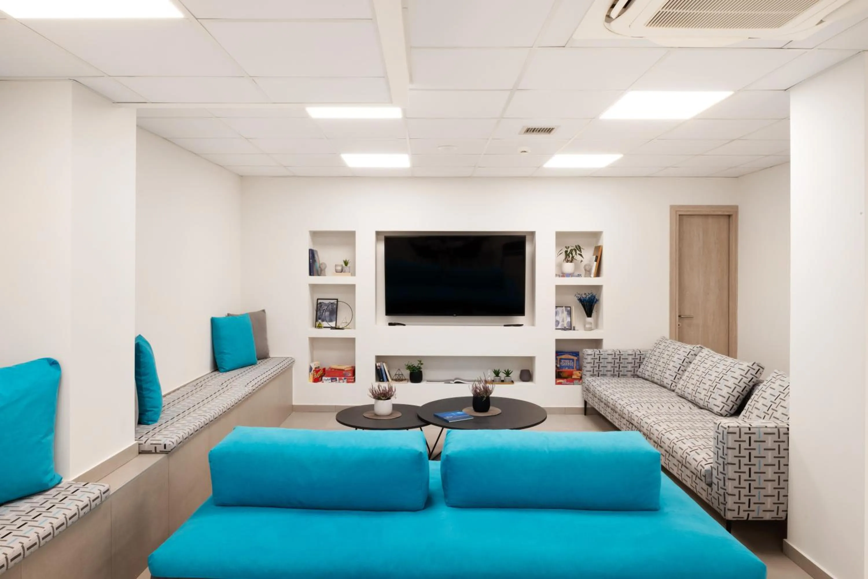 Communal lounge/ TV room in Thess Residences