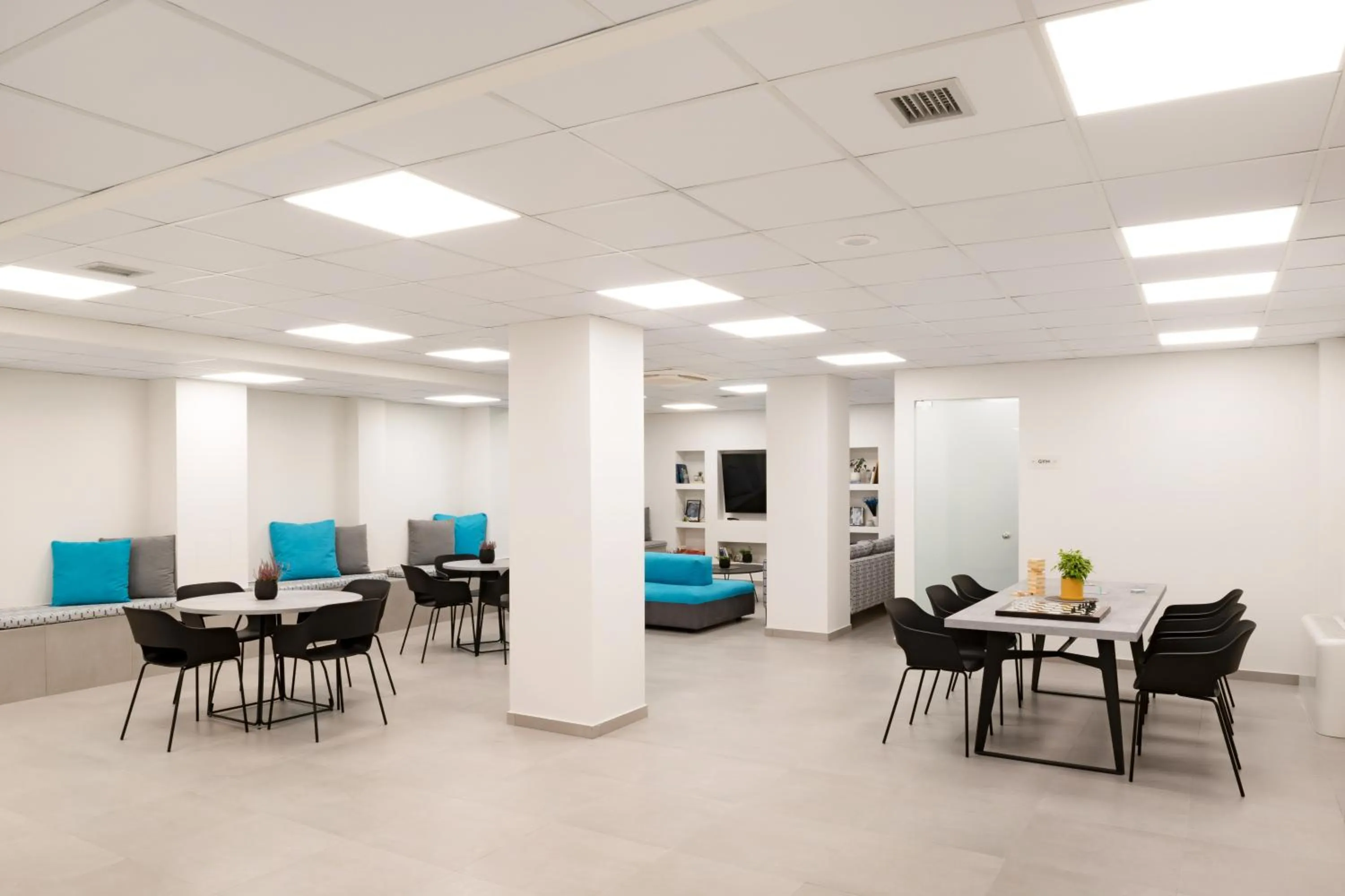 Communal lounge/ TV room in Thess Residences