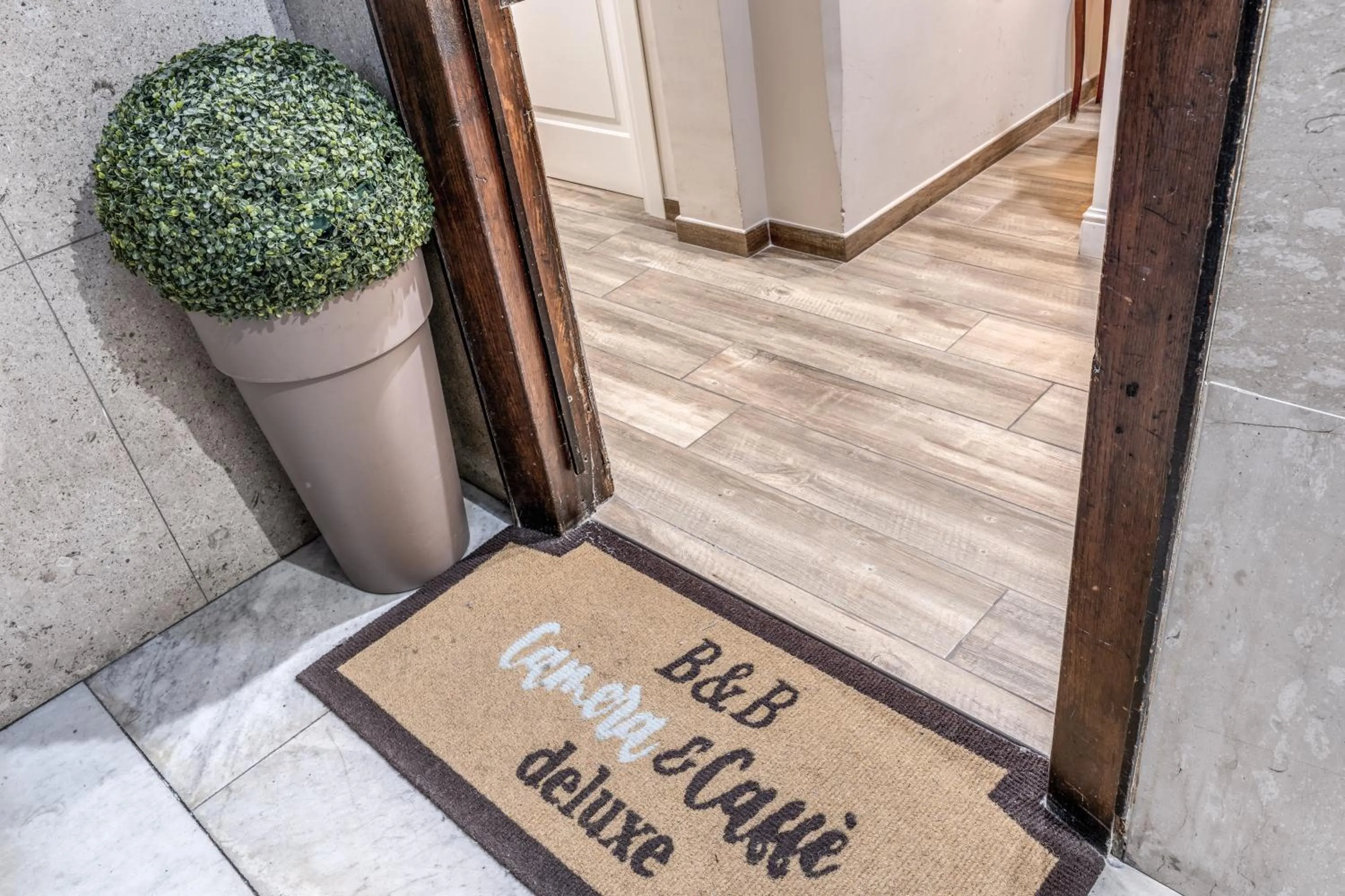 Logo/Certificate/Sign in Camera e Caffé DeLuxe