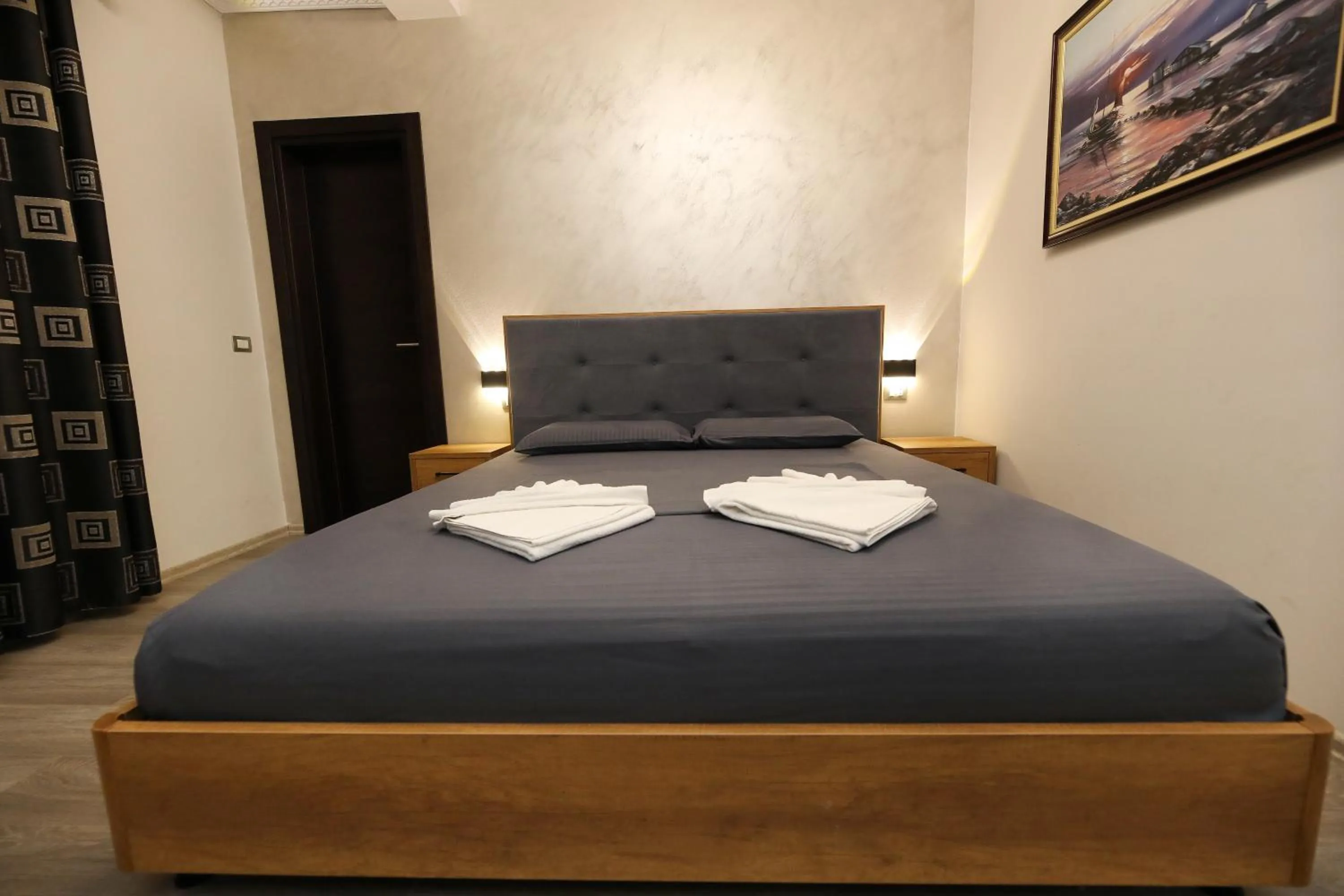 Bed in Hotel Salvadore