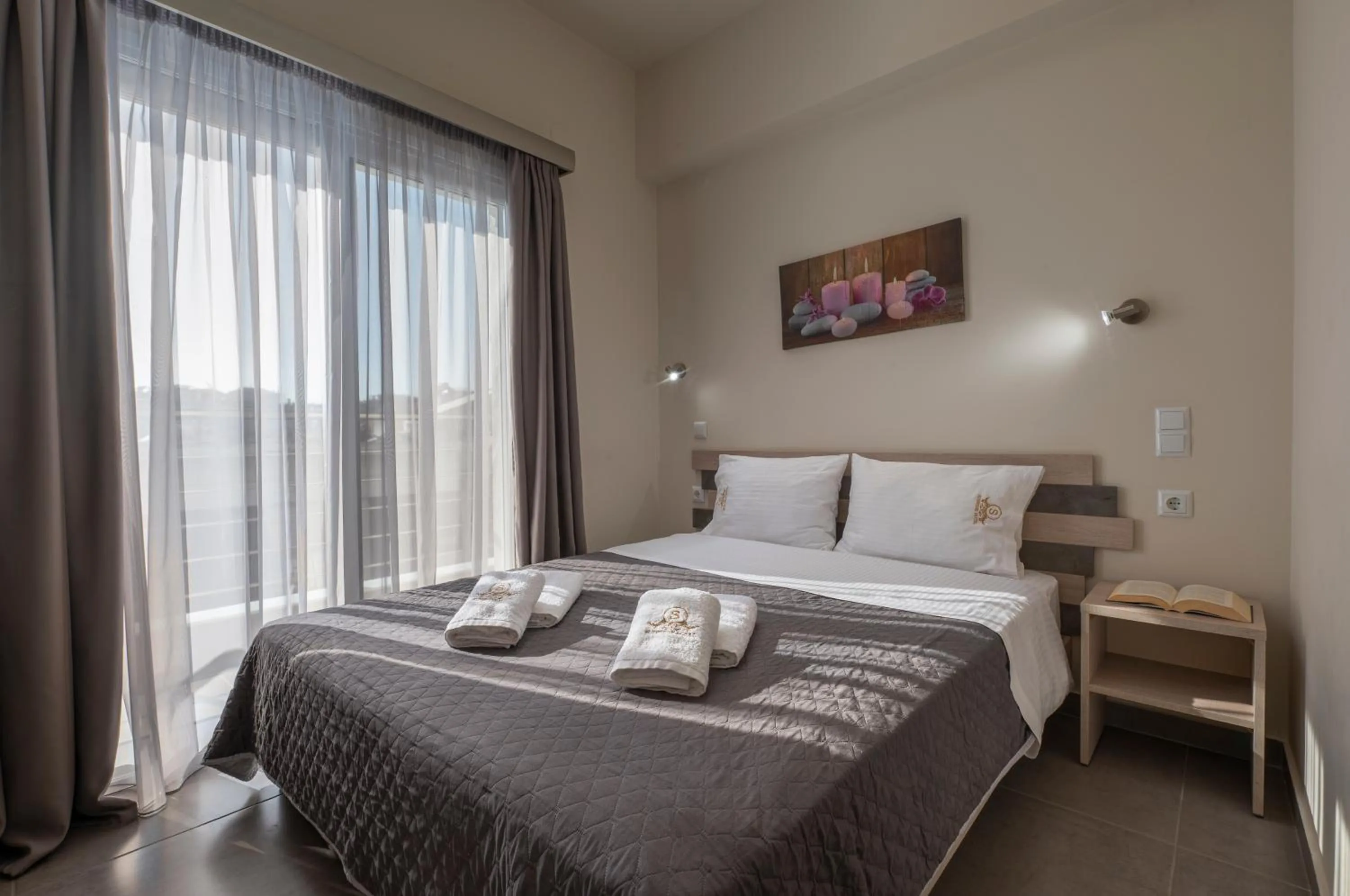 Bed in Sunshine Apartments