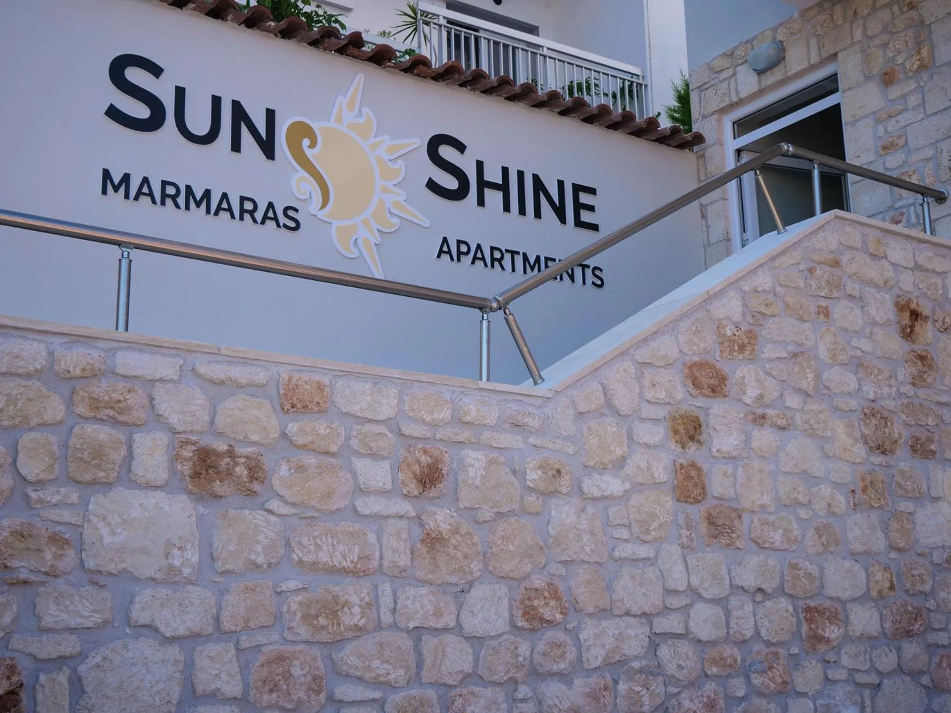 Property logo or sign in Sunshine Apartments