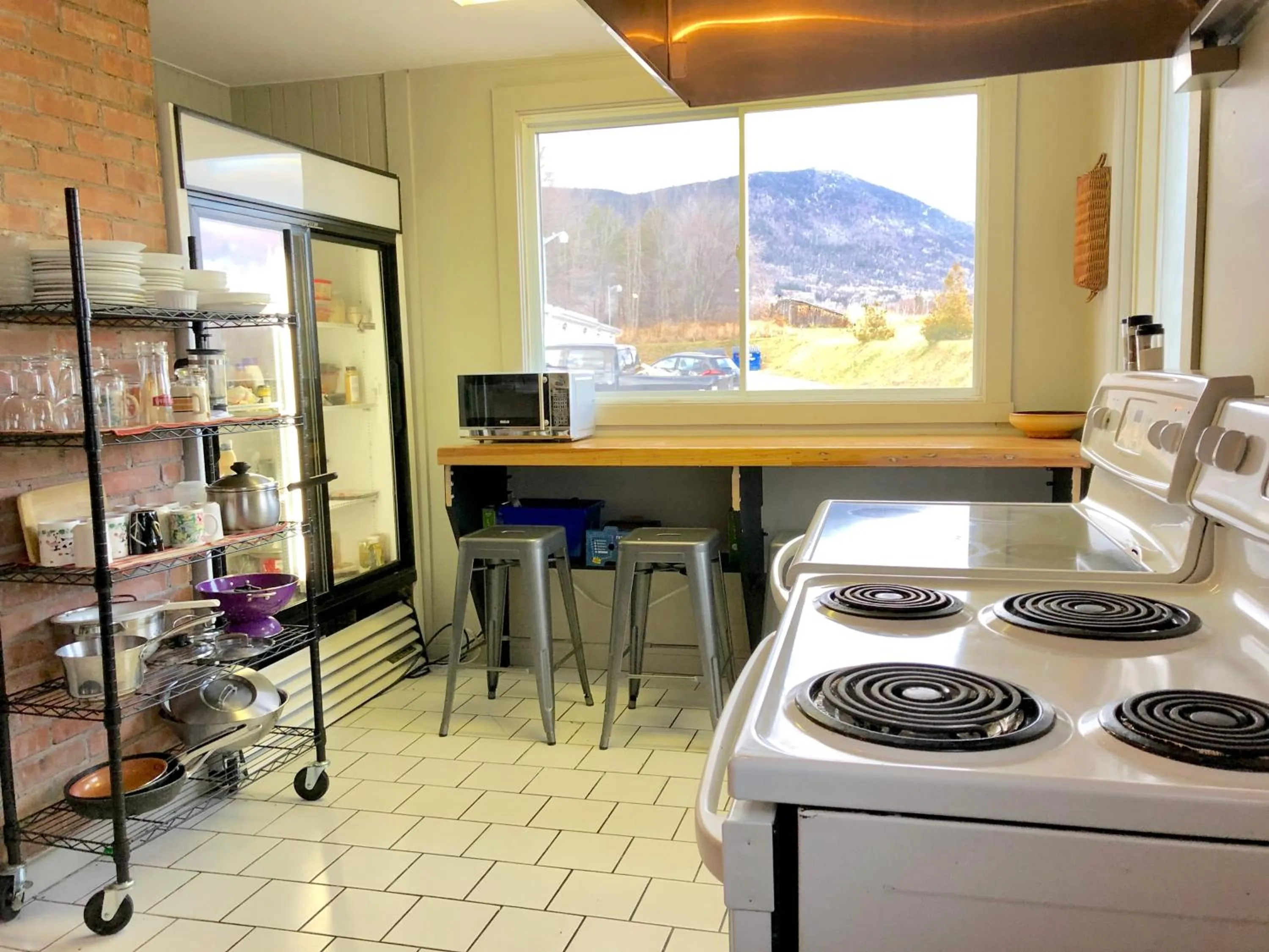 Kitchen or kitchenette in Bleu Mer, hôtel & résidences