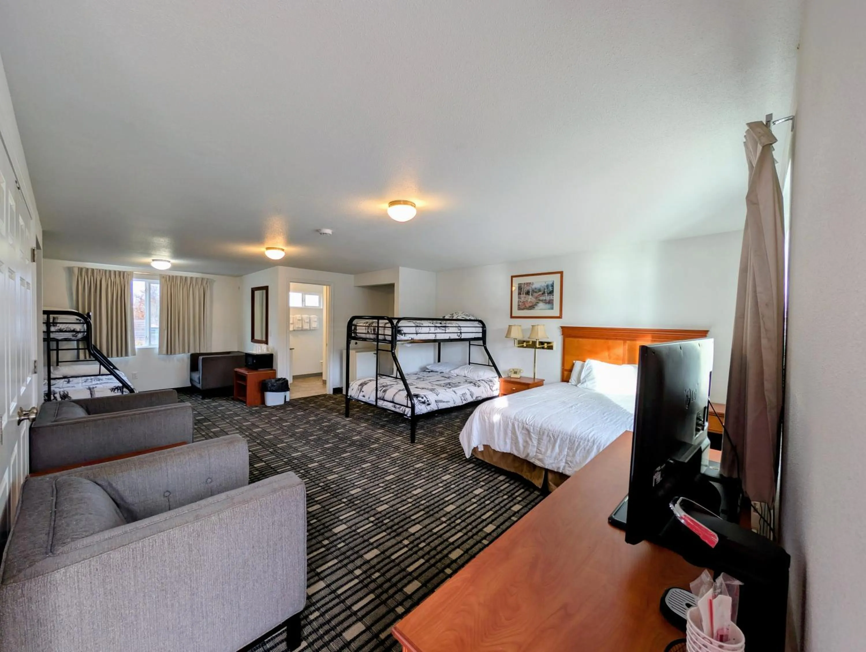 Bed in Ponderosa Motel