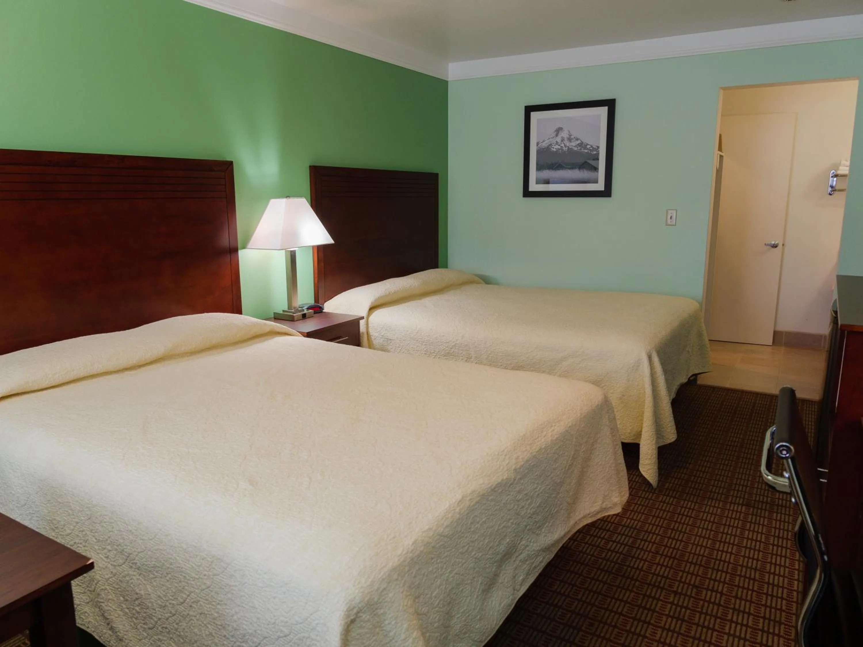 Bed in Sweet Home Inn