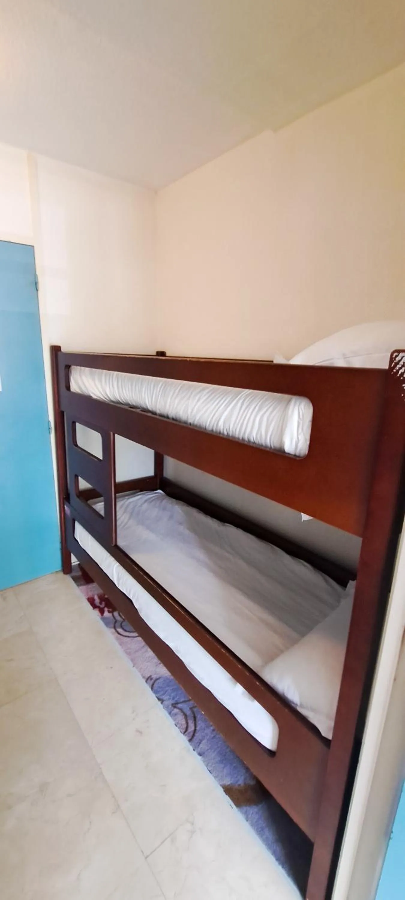 Bed in Appart'hôtel Le Trianon