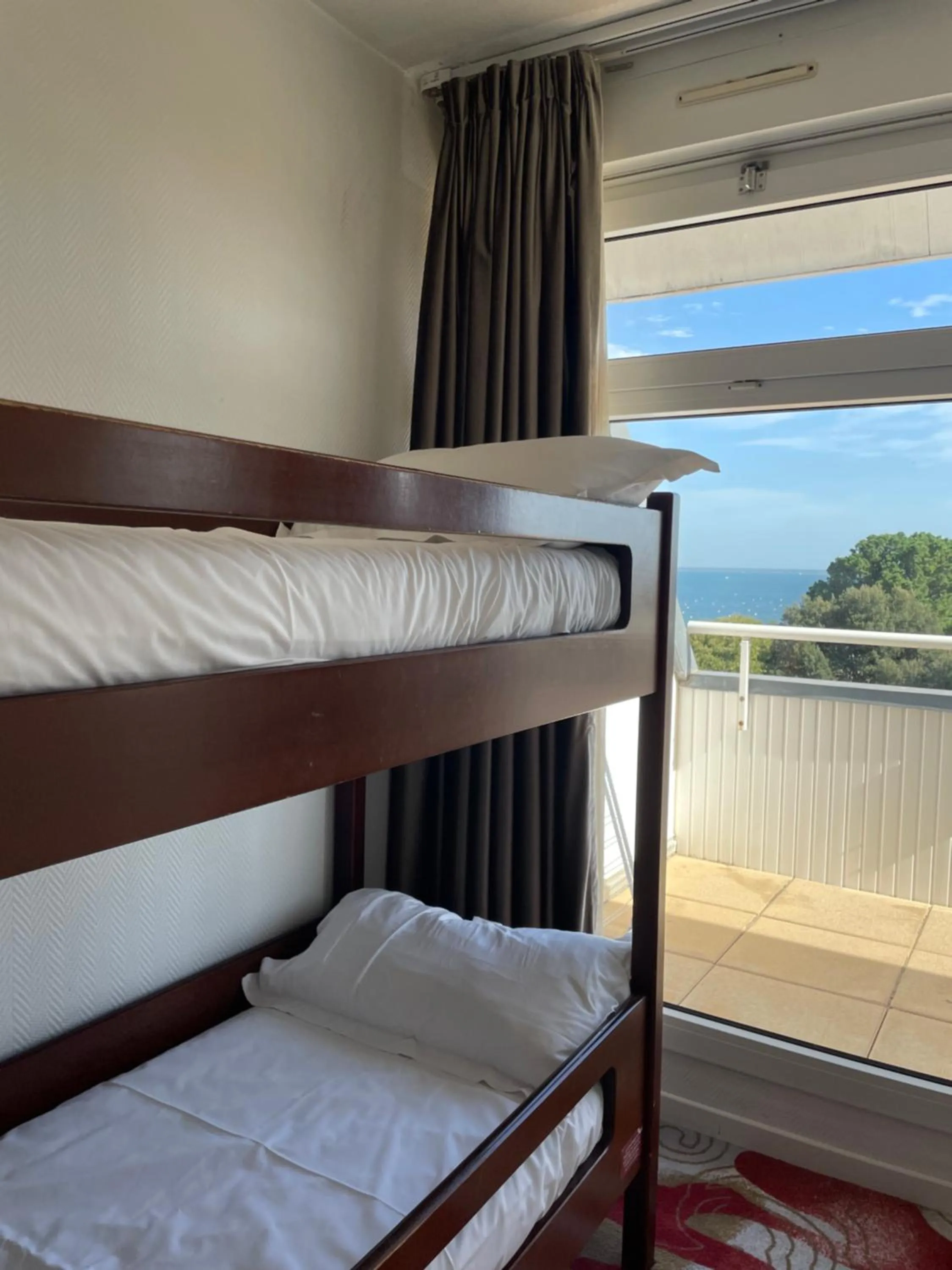 Bed in Appart'hôtel Le Trianon