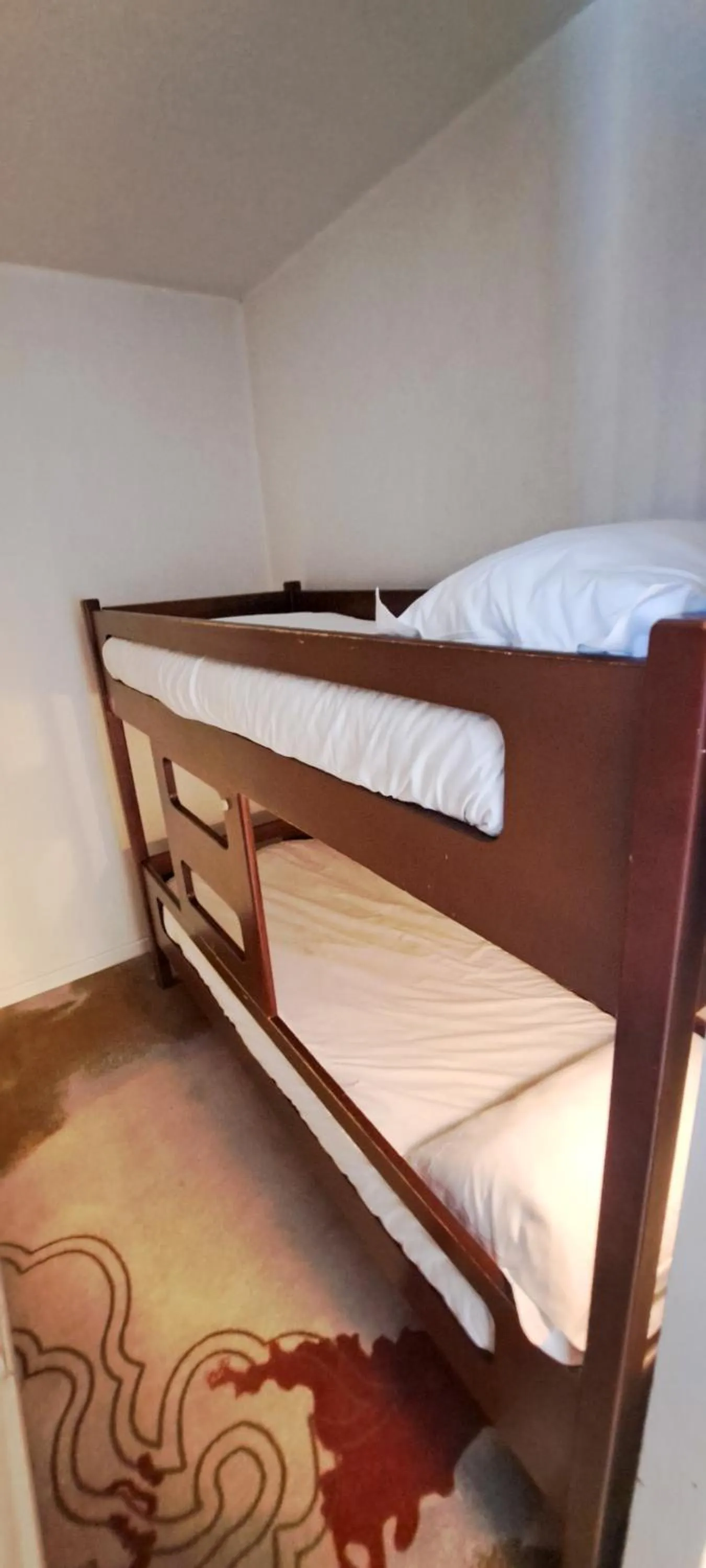 Bed in Appart'hôtel Le Trianon