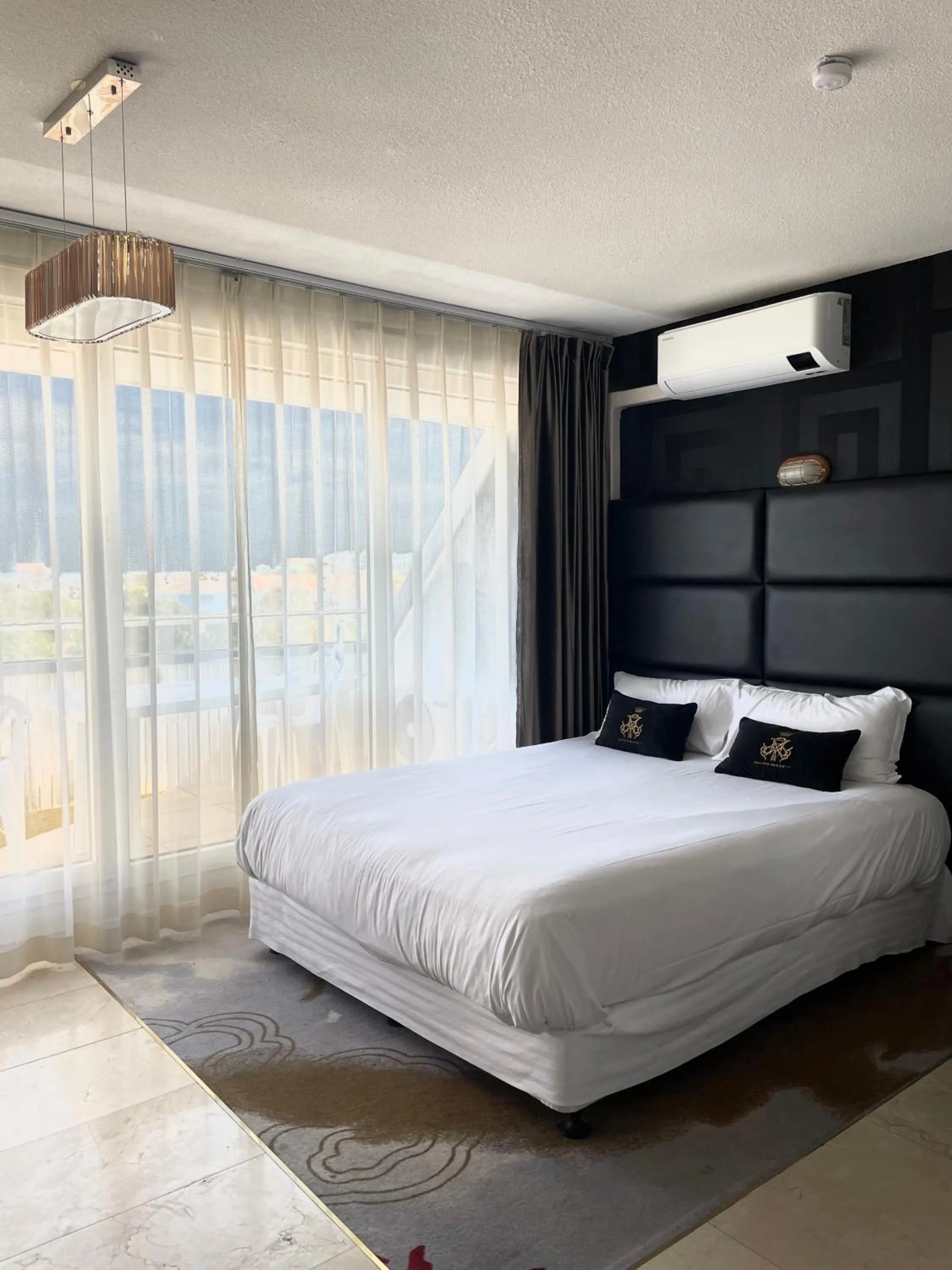 Bed in Appart'hôtel Le Trianon