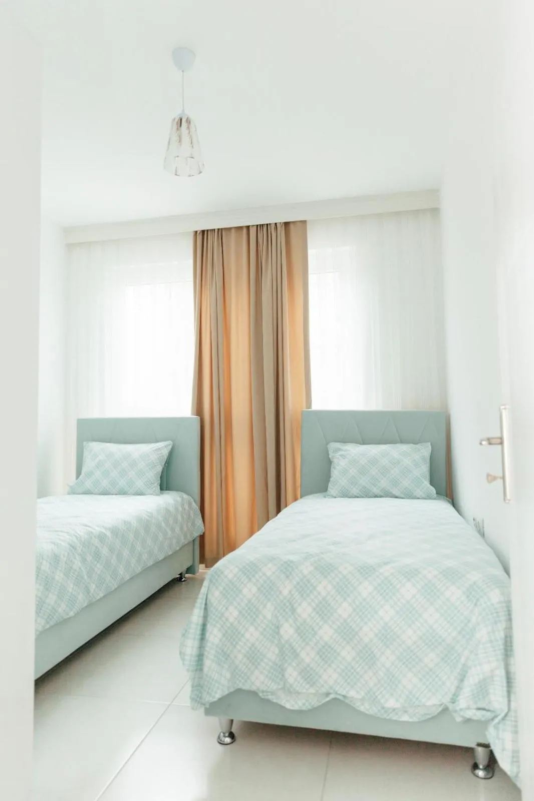 Bed in Sare Suites Downtown