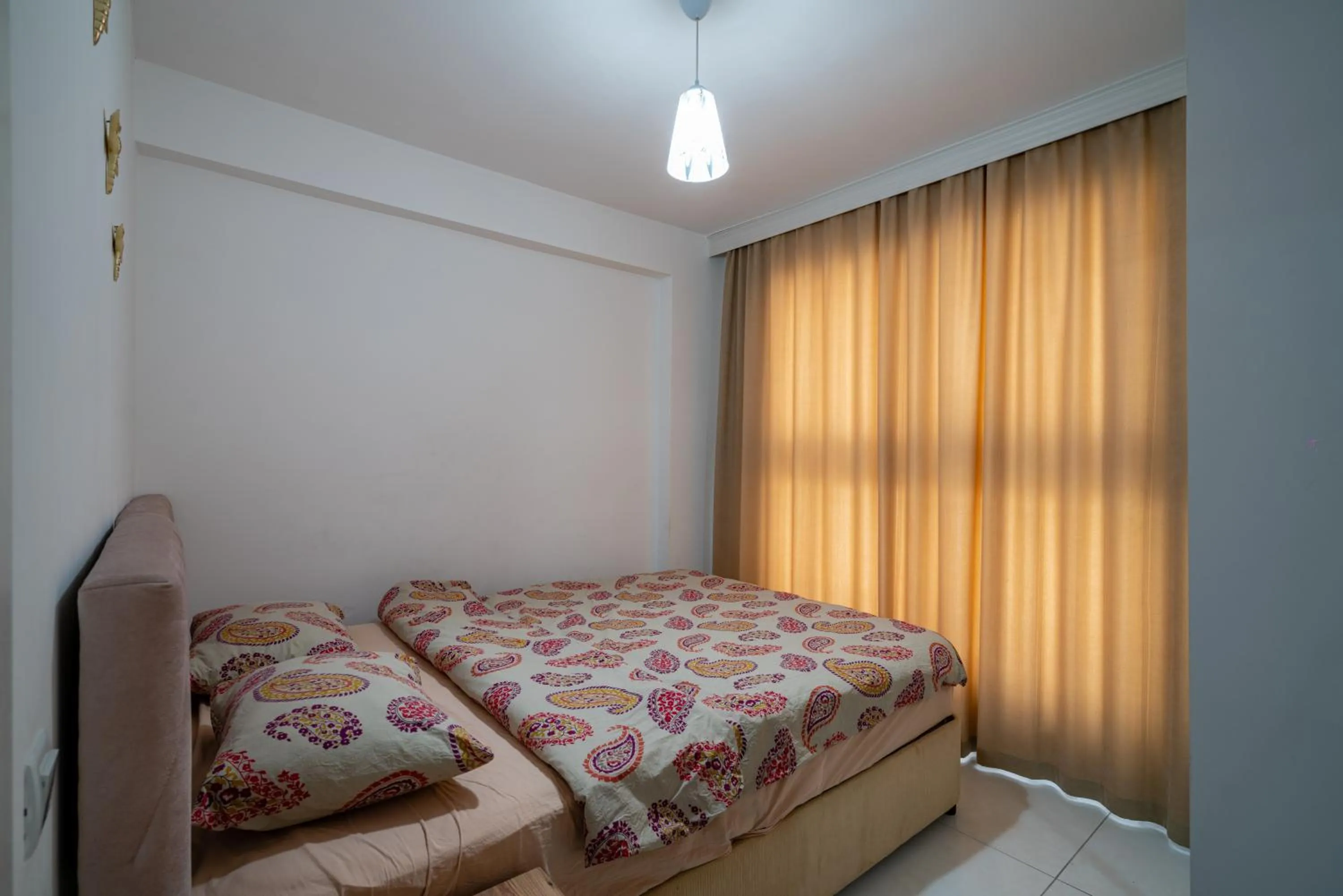 Bed in Sare Suites Downtown