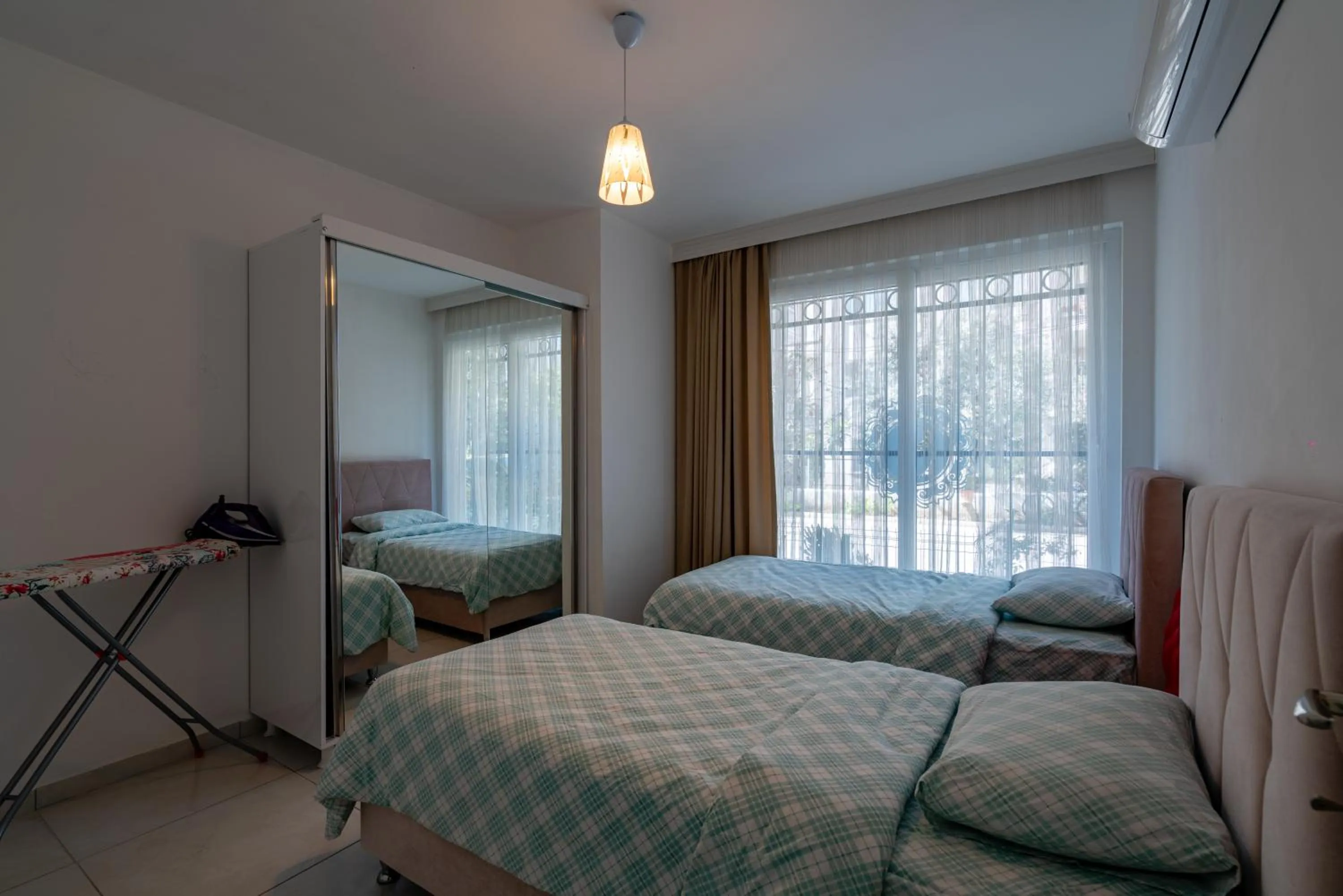 Bed in Sare Suites Downtown