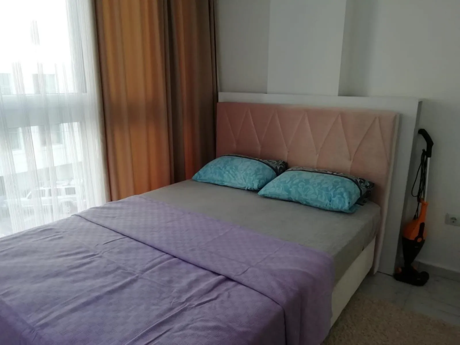 Bed in Sare Suites Downtown