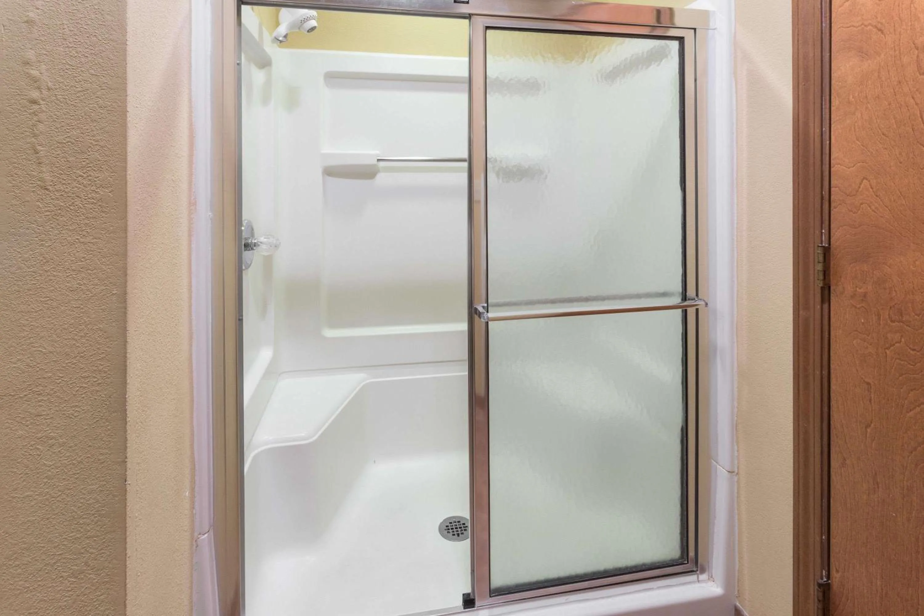 Bathroom in Ramada by Wyndham Bettendorf