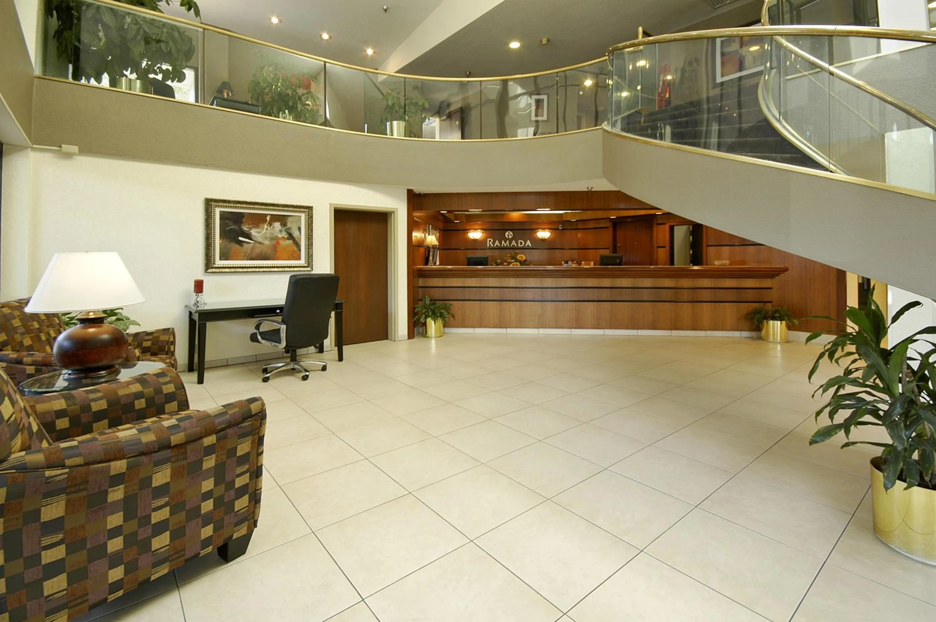 Lobby or reception in Ramada by Wyndham Bettendorf