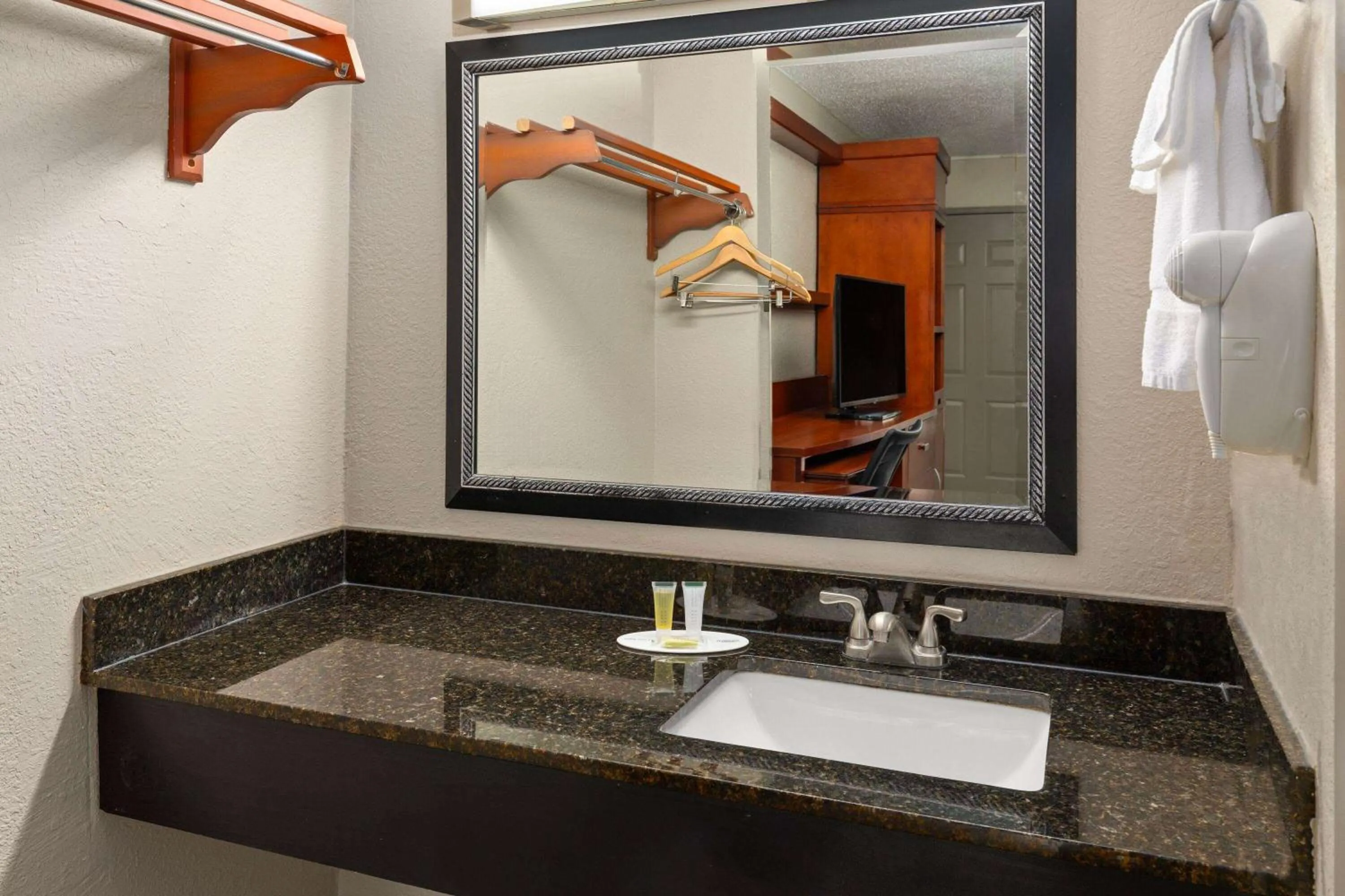 Bathroom in Days Inn by Wyndham Knoxville East