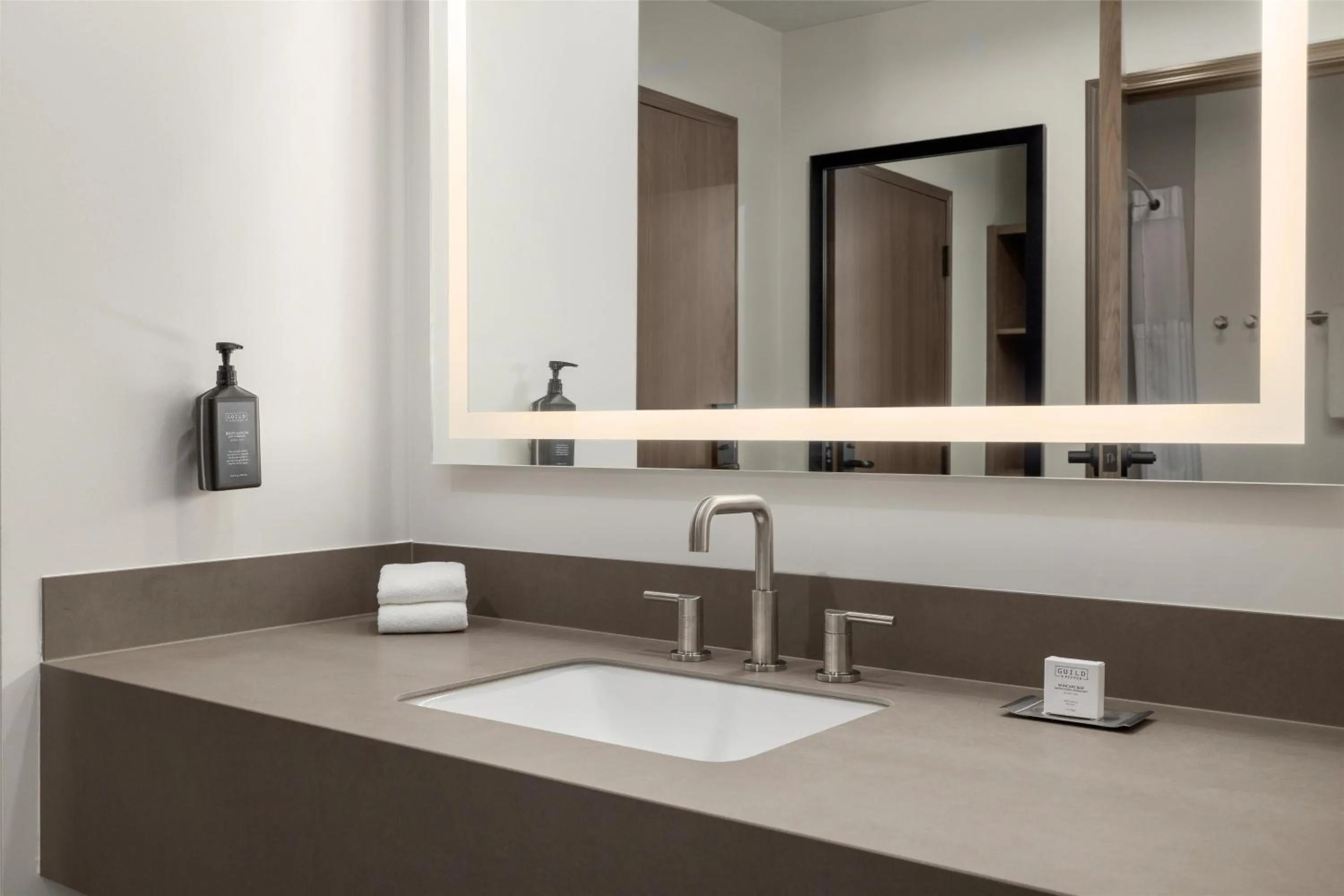 Bathroom in Starlite Yellowstone, Tapestry Collection by Hilton