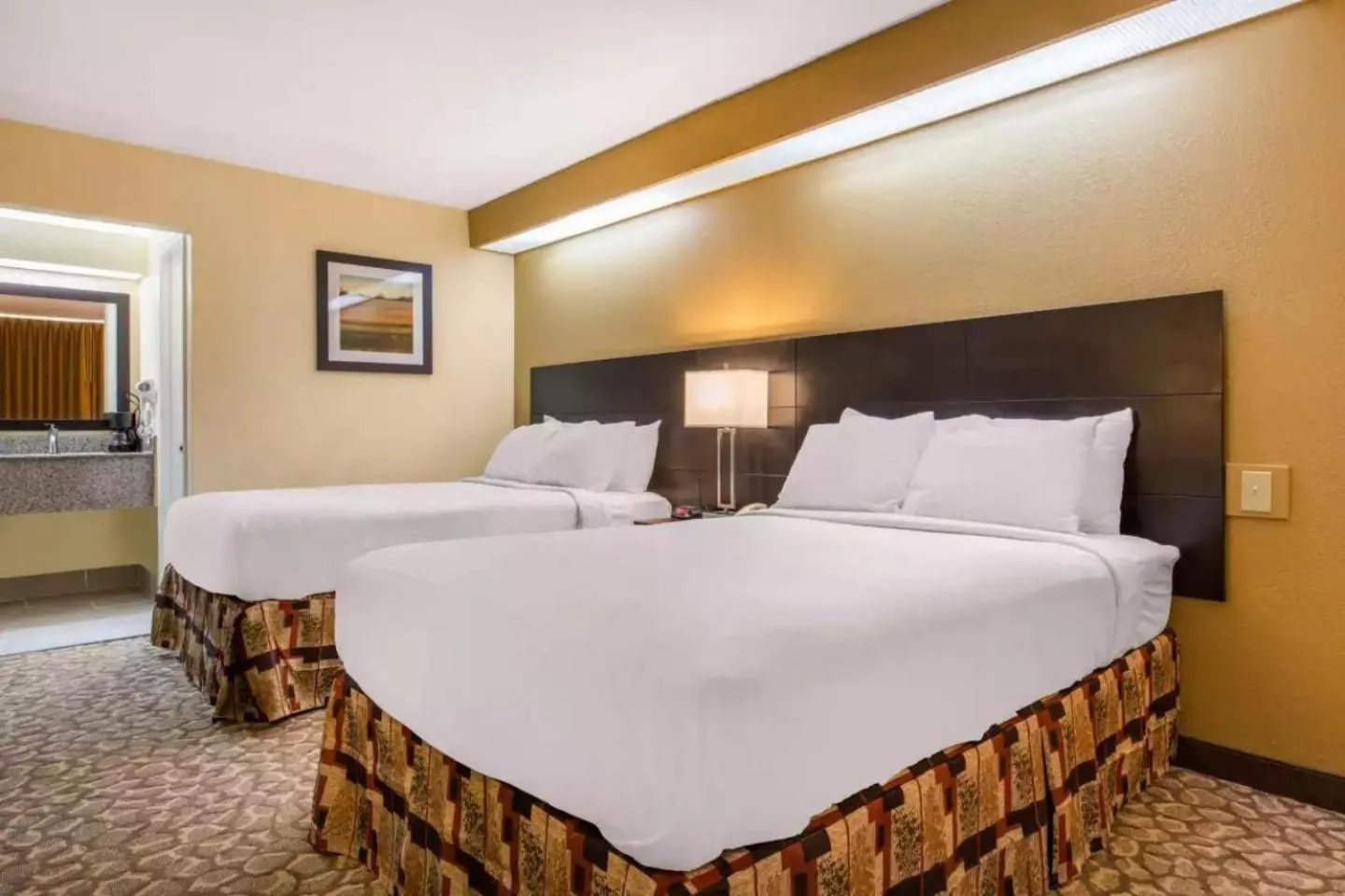 Bed in Ramada by Wyndham Santee I-95