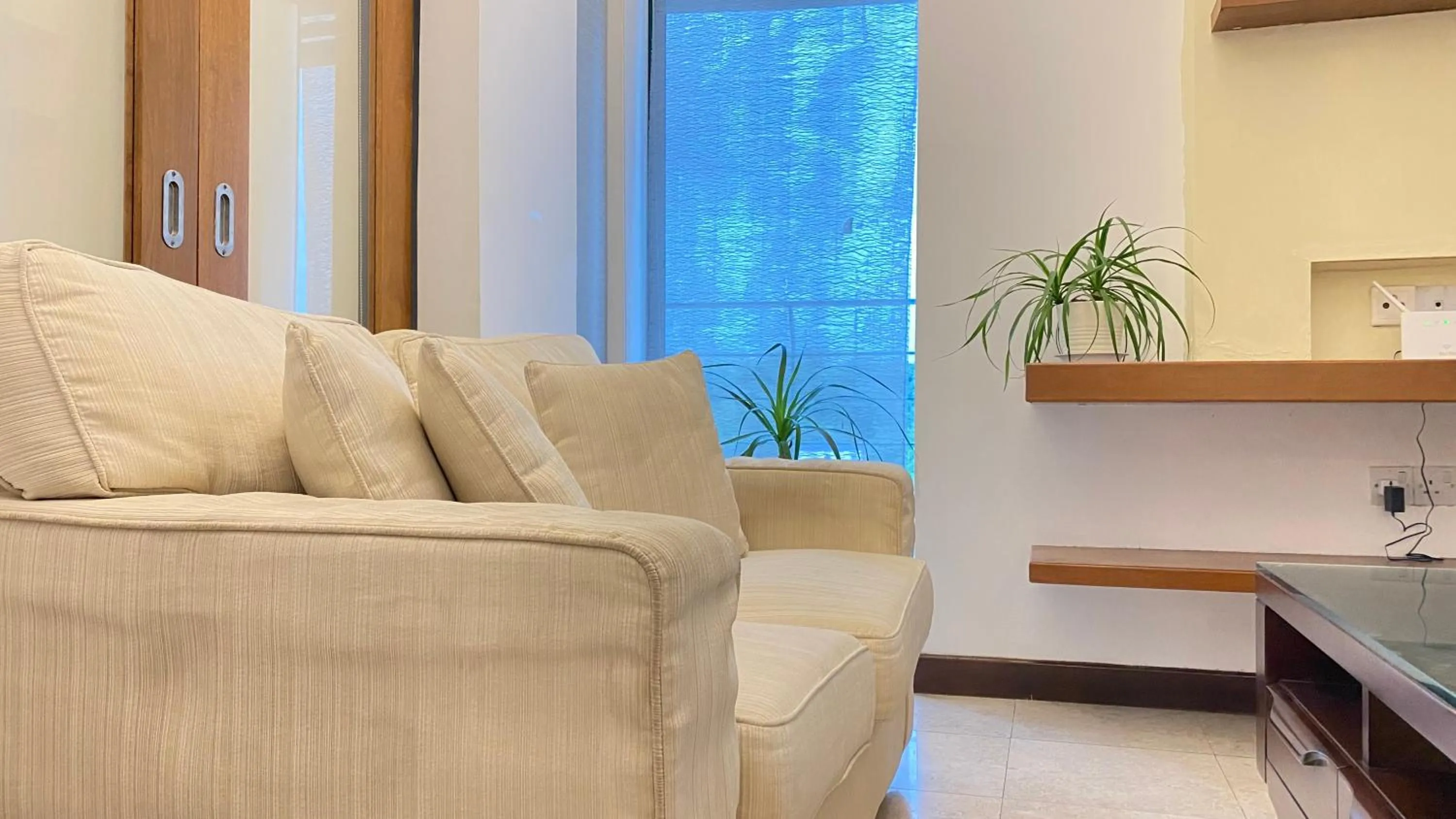 Living room in Peninsula Residence All Suite Hotel