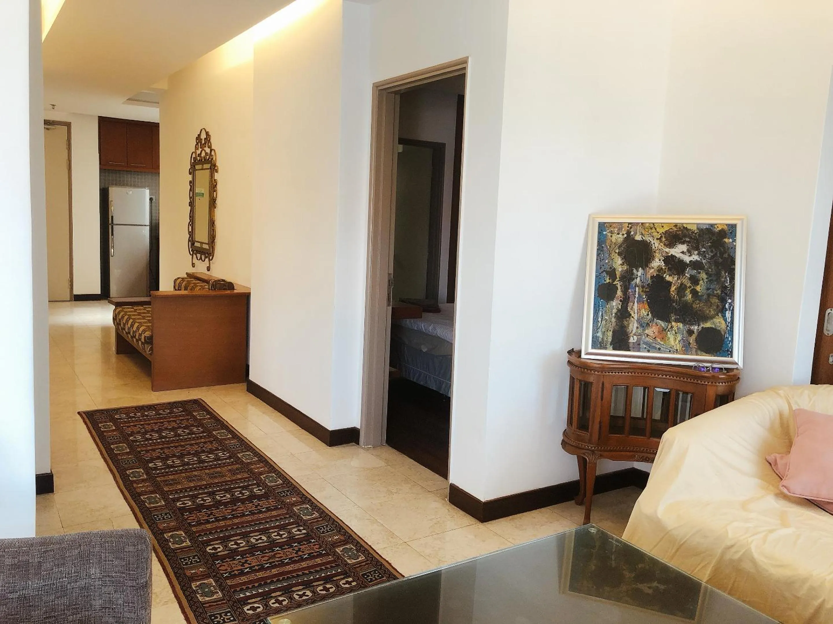 Living room in Peninsula Residence All Suite Hotel