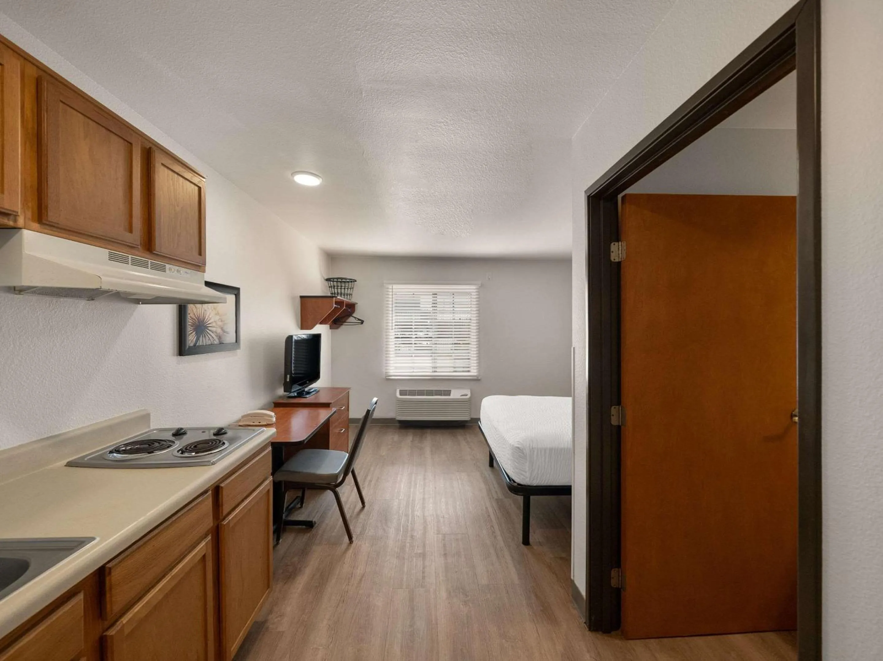 Bedroom, Bed in WoodSpring Suites Dallas Rockwall