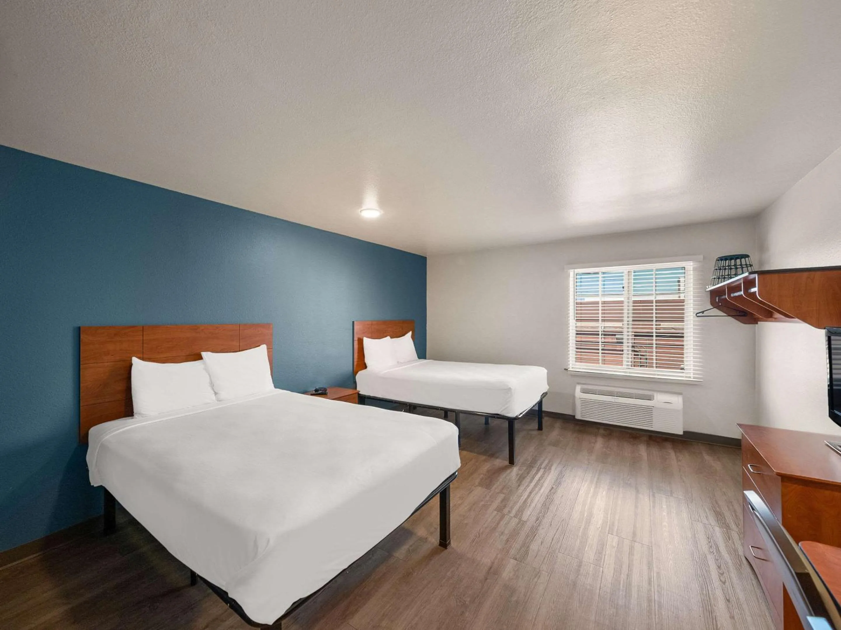 Bedroom, Bed in WoodSpring Suites Dallas Rockwall
