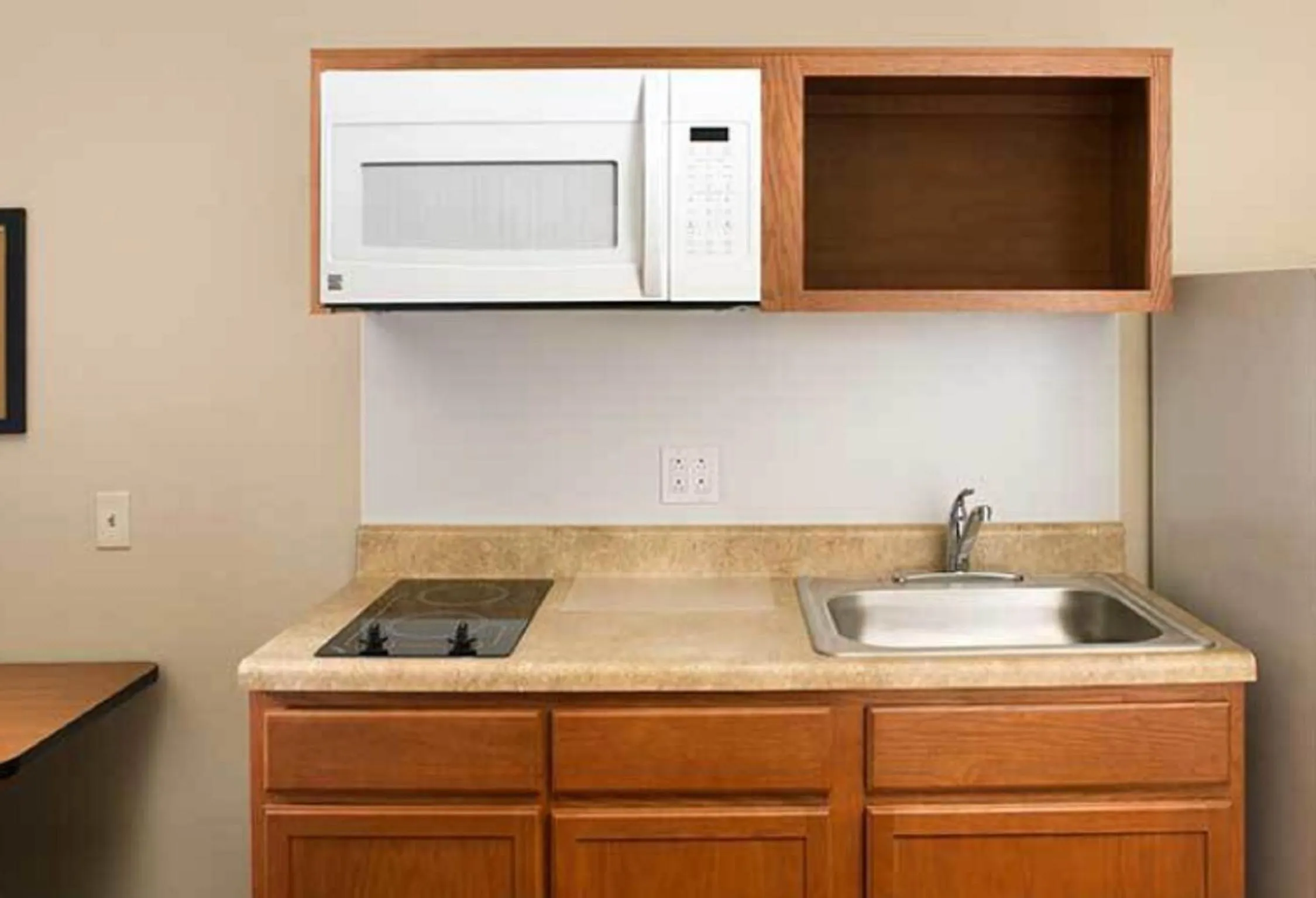 Kitchen or kitchenette in WoodSpring Suites Dallas Rockwall