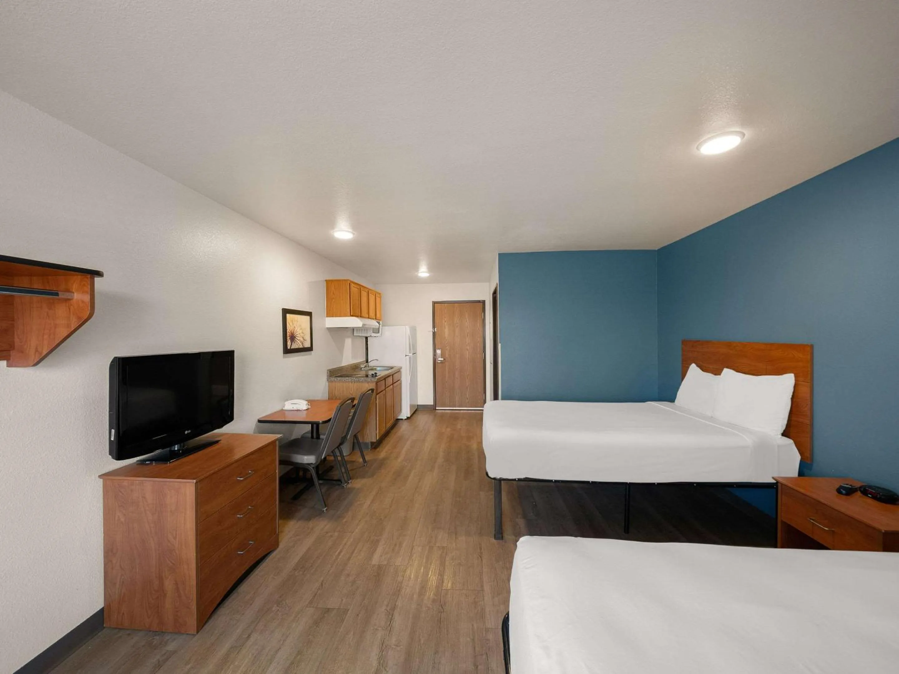 Bedroom, Bed in WoodSpring Suites Dallas Rockwall