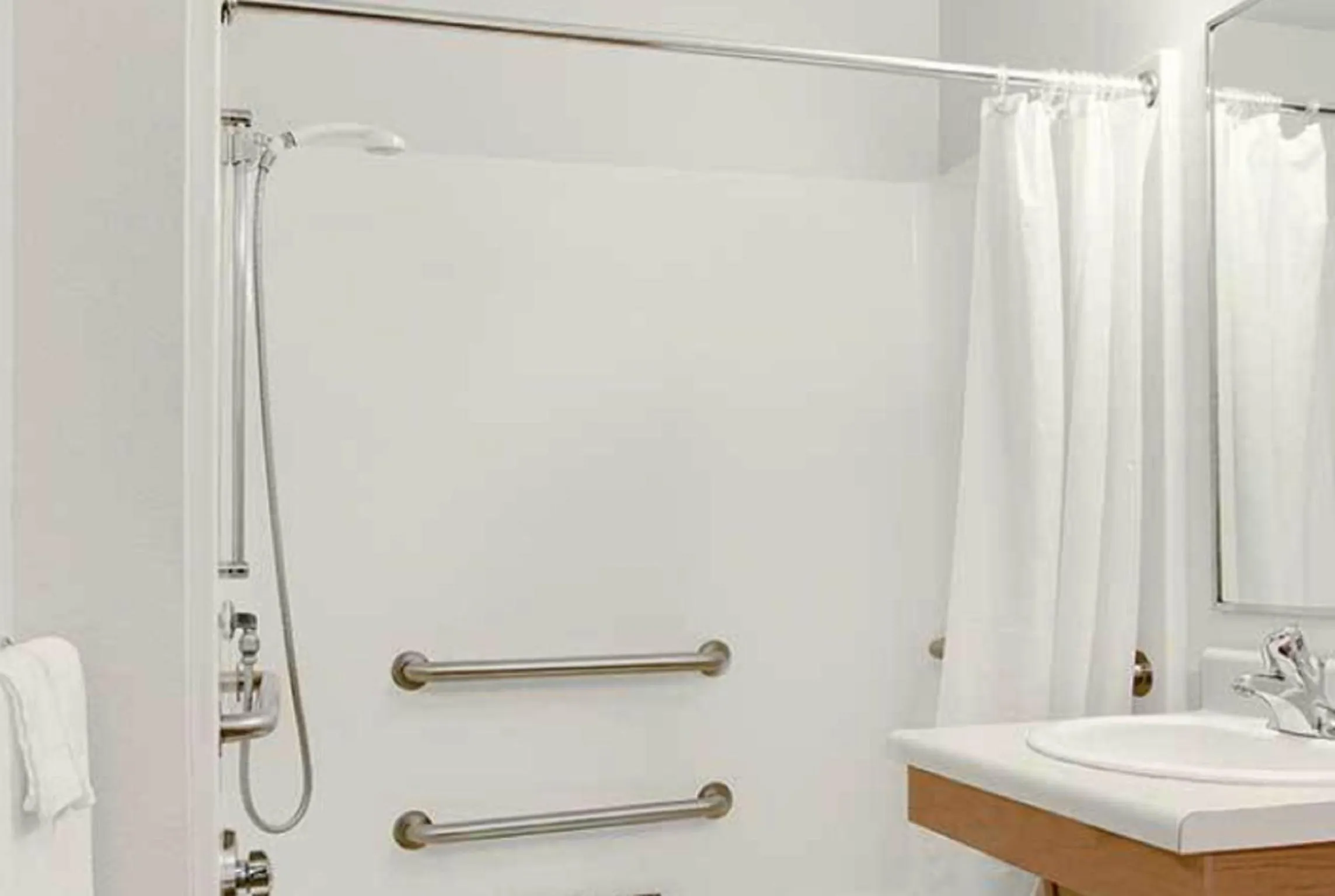 Bathroom in WoodSpring Suites Dallas Rockwall