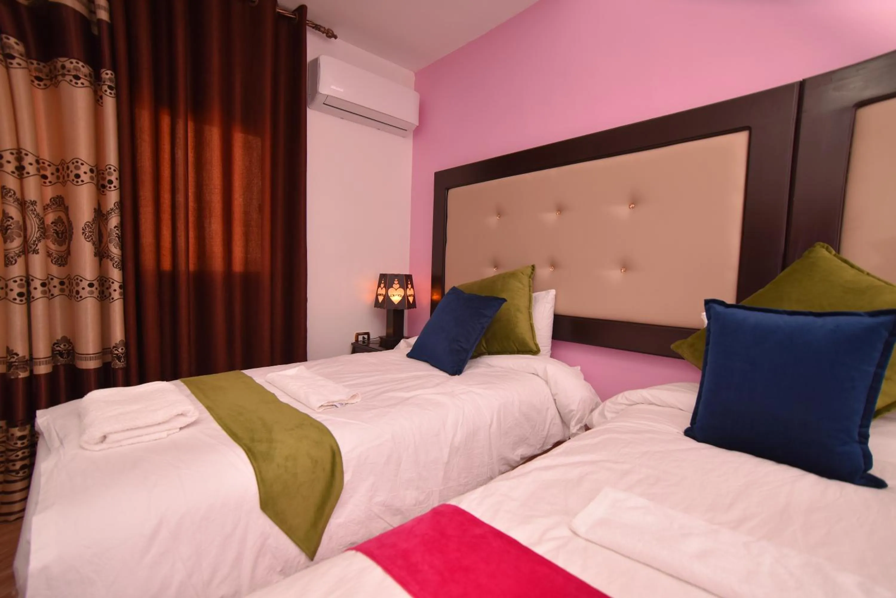 Bed in Petra Guests Hotel