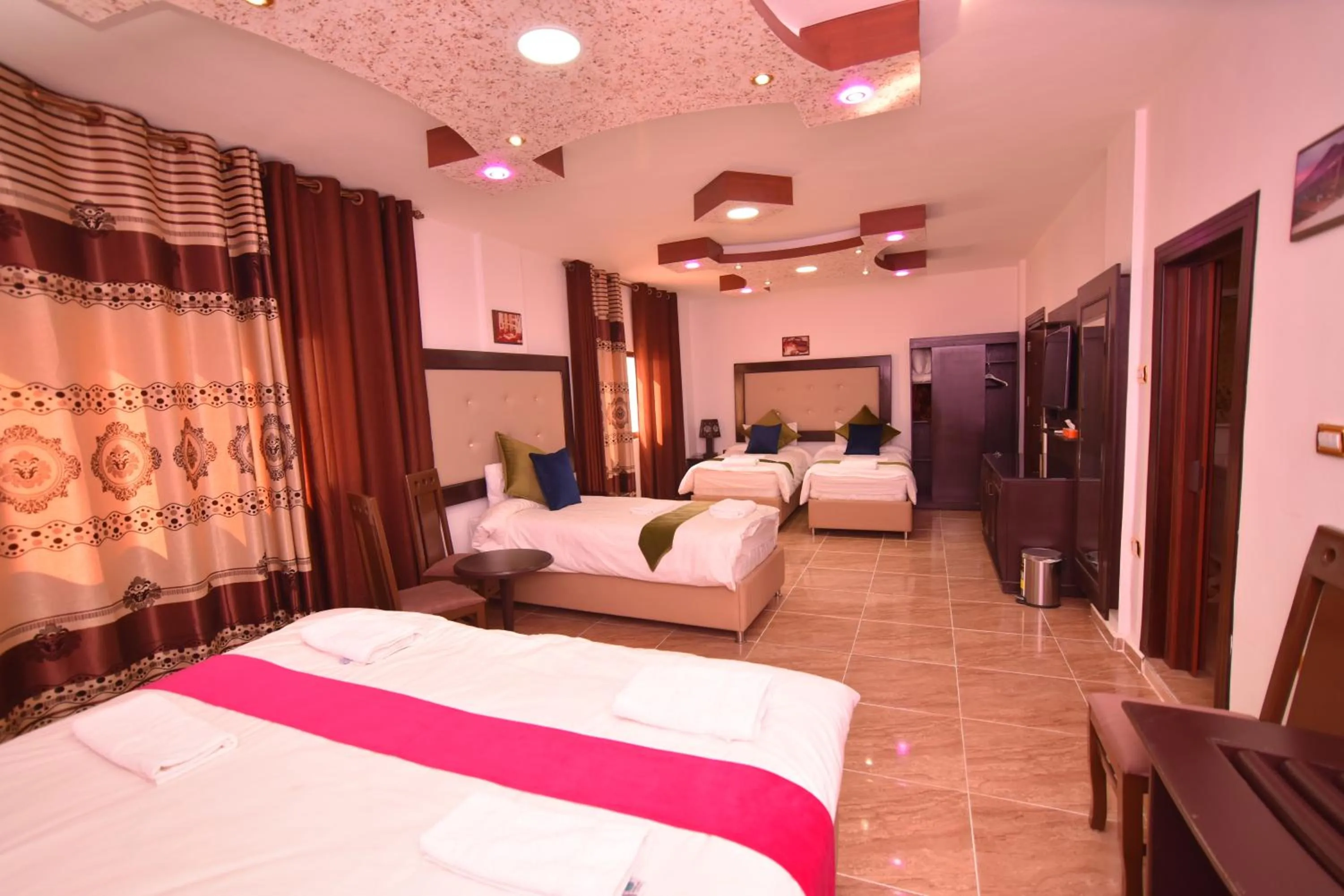 Photo of the whole room, Bed in Petra Guests Hotel