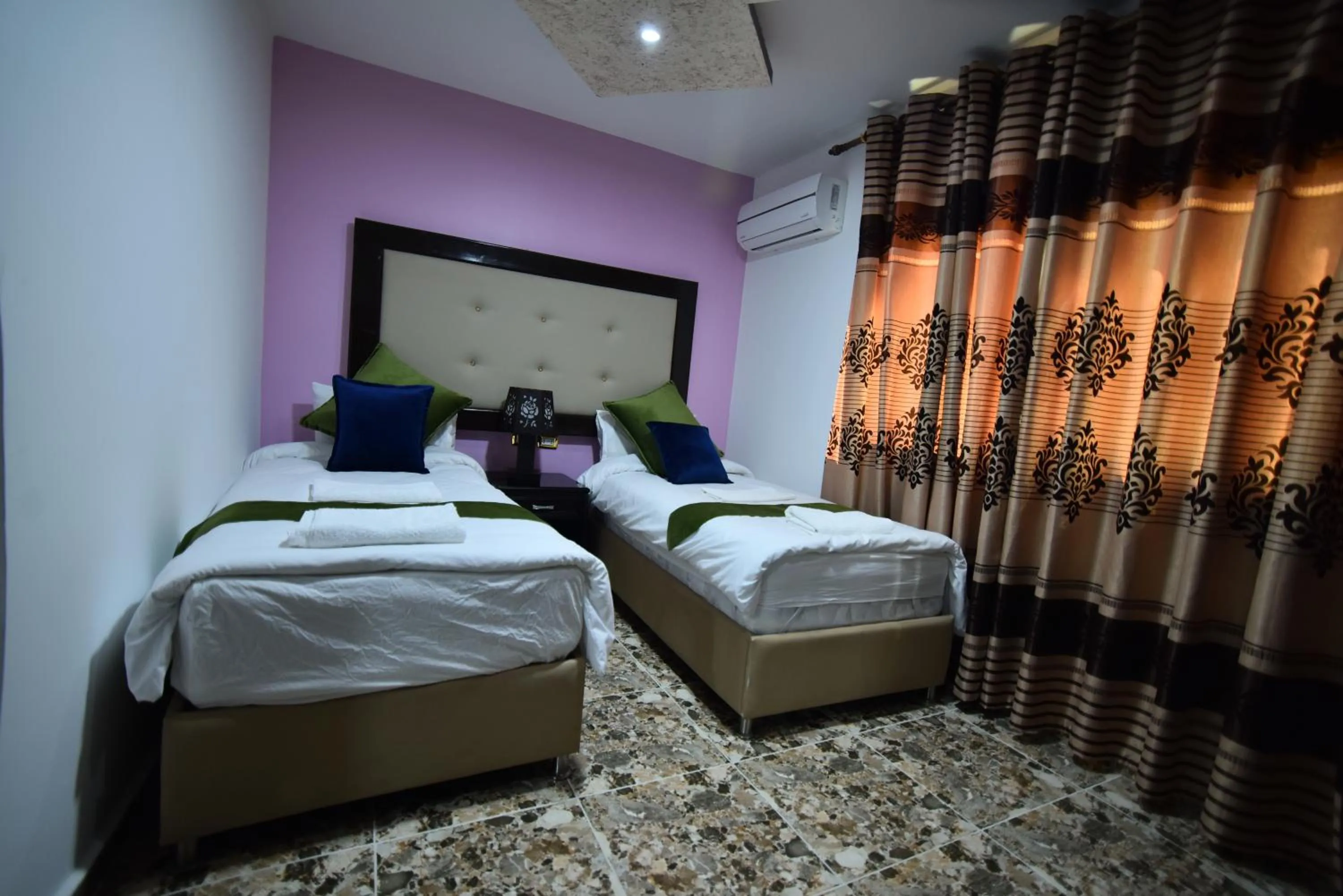 Photo of the whole room, Bed in Petra Guests Hotel