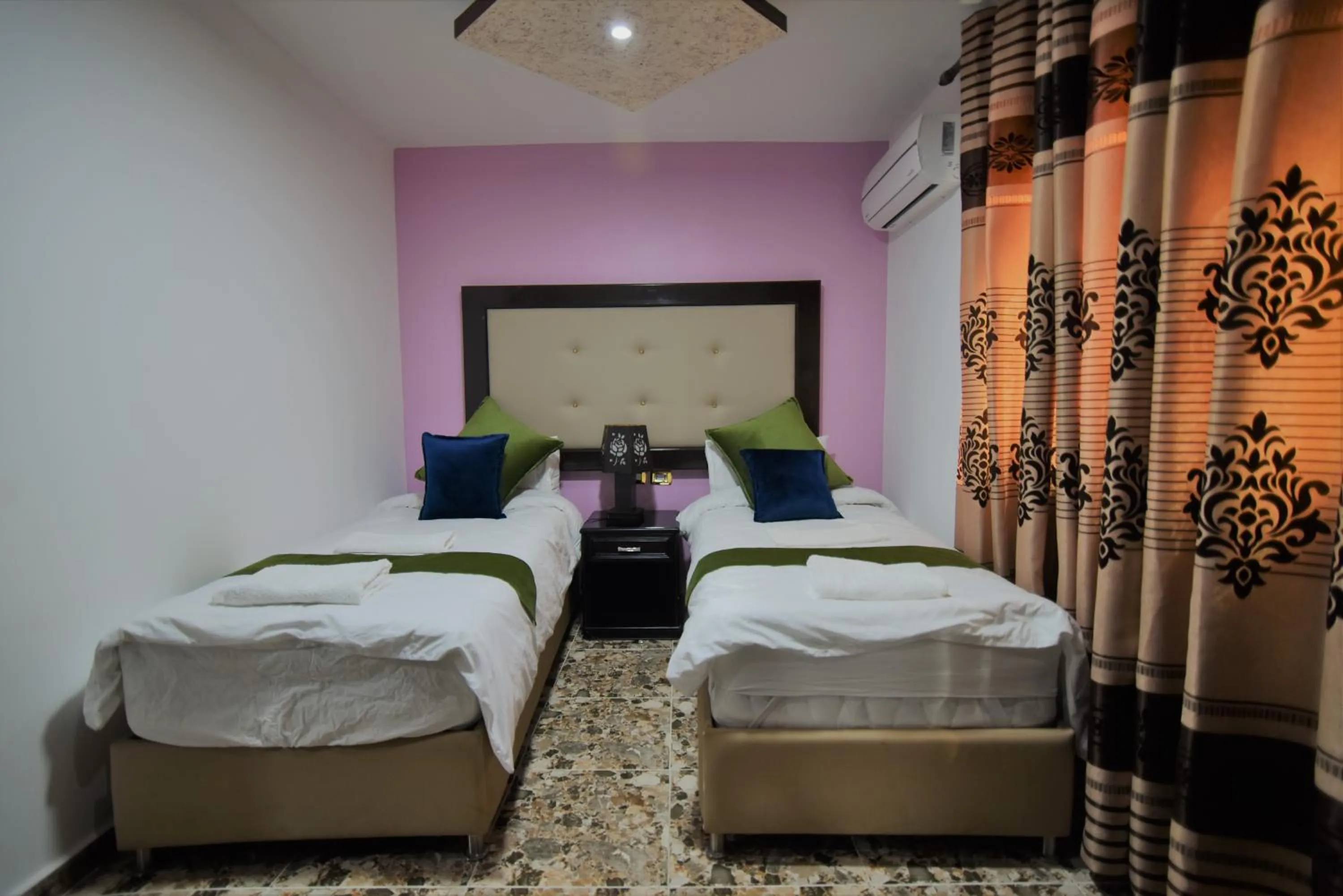 Bed in Petra Guests Hotel