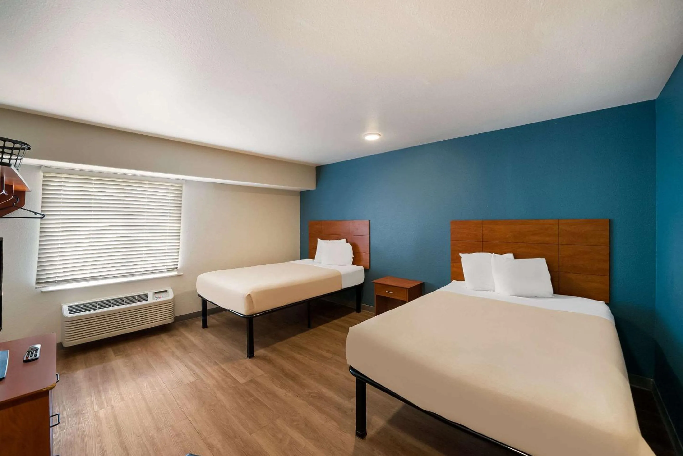 Bedroom, Bed in WoodSpring Suites Fort Worth Fossil Creek